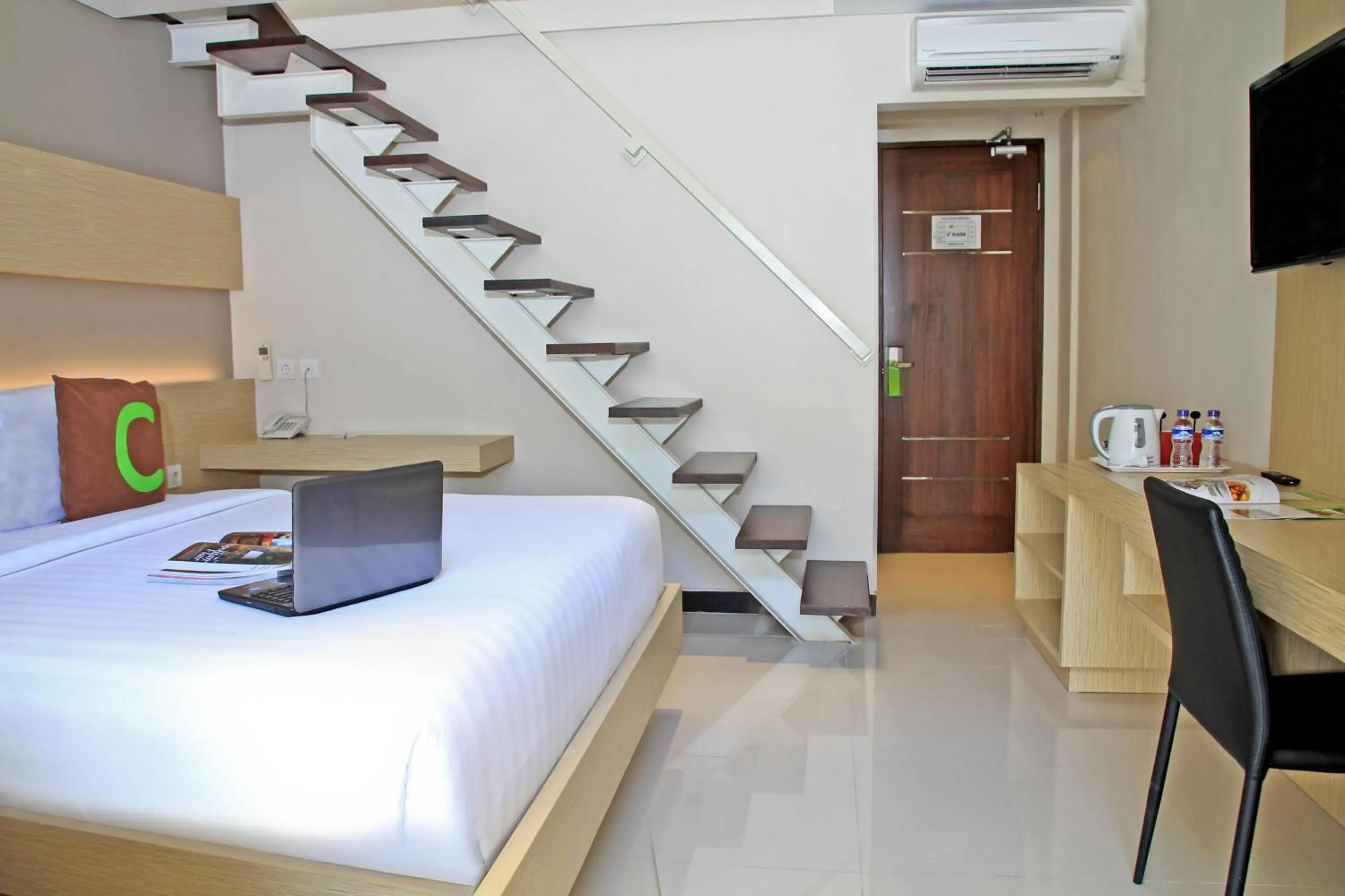 Bedroom, Bed in Choice Stay Hotel Denpasar