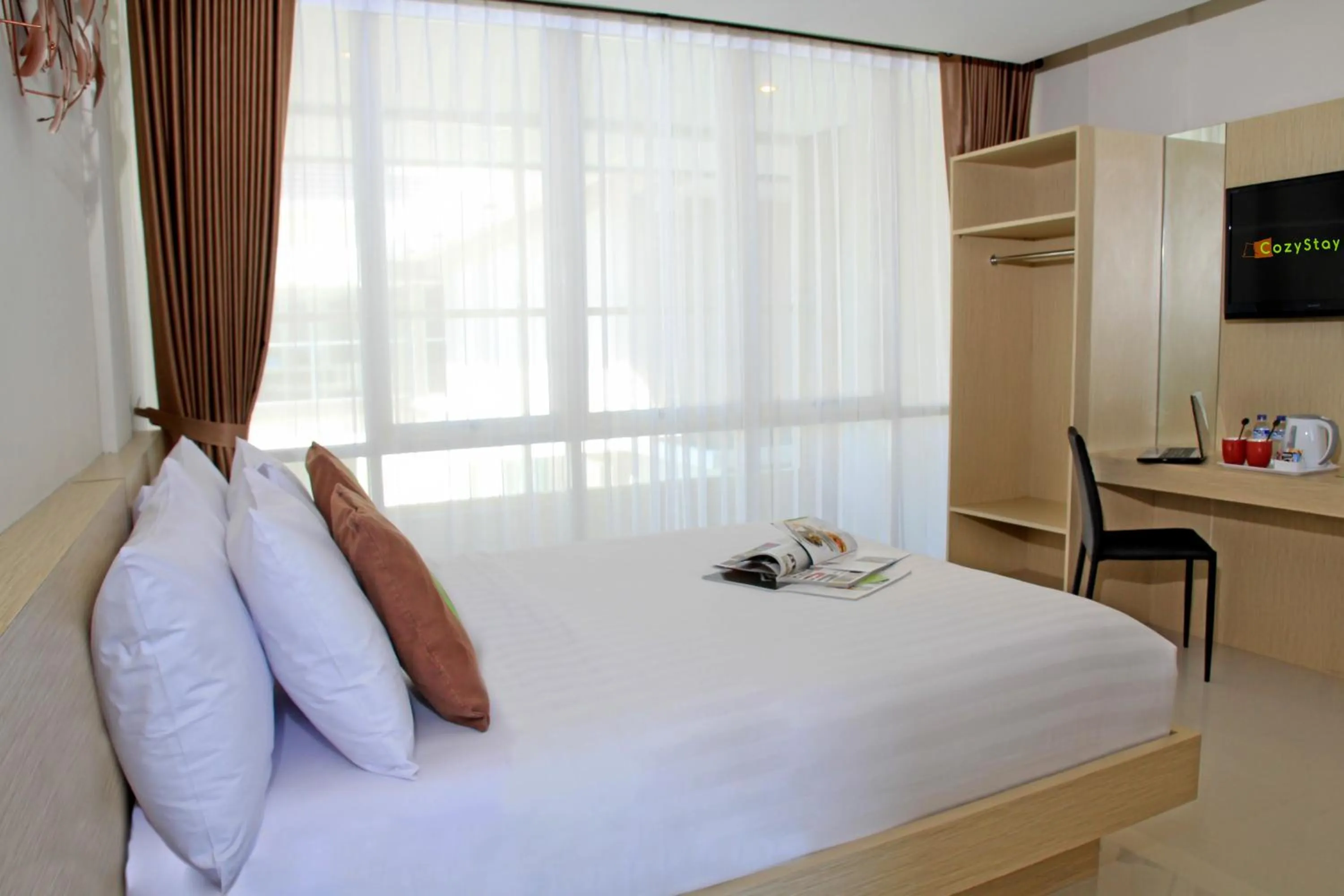 Bedroom, Bed in Choice Stay Hotel Denpasar