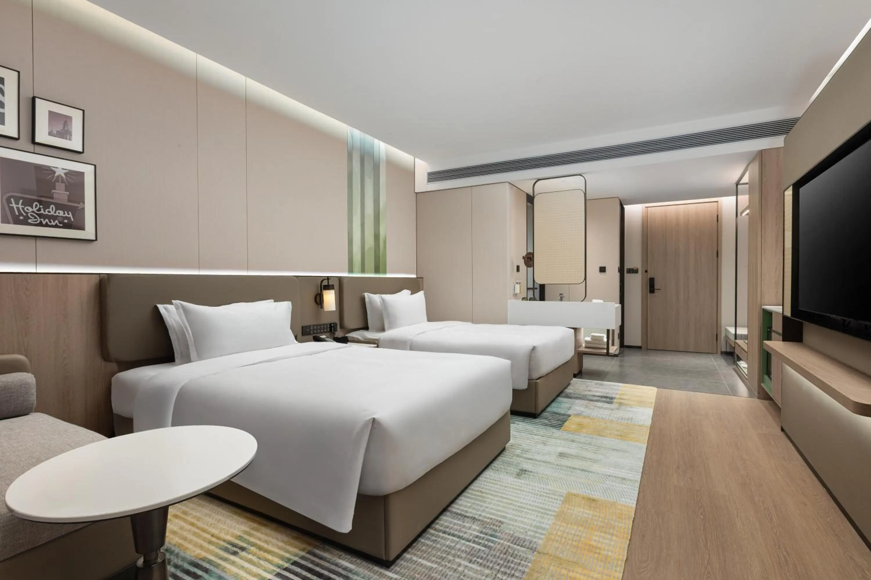 Bed in Holiday Inn & Suites Shanghai Changfeng by IHG
