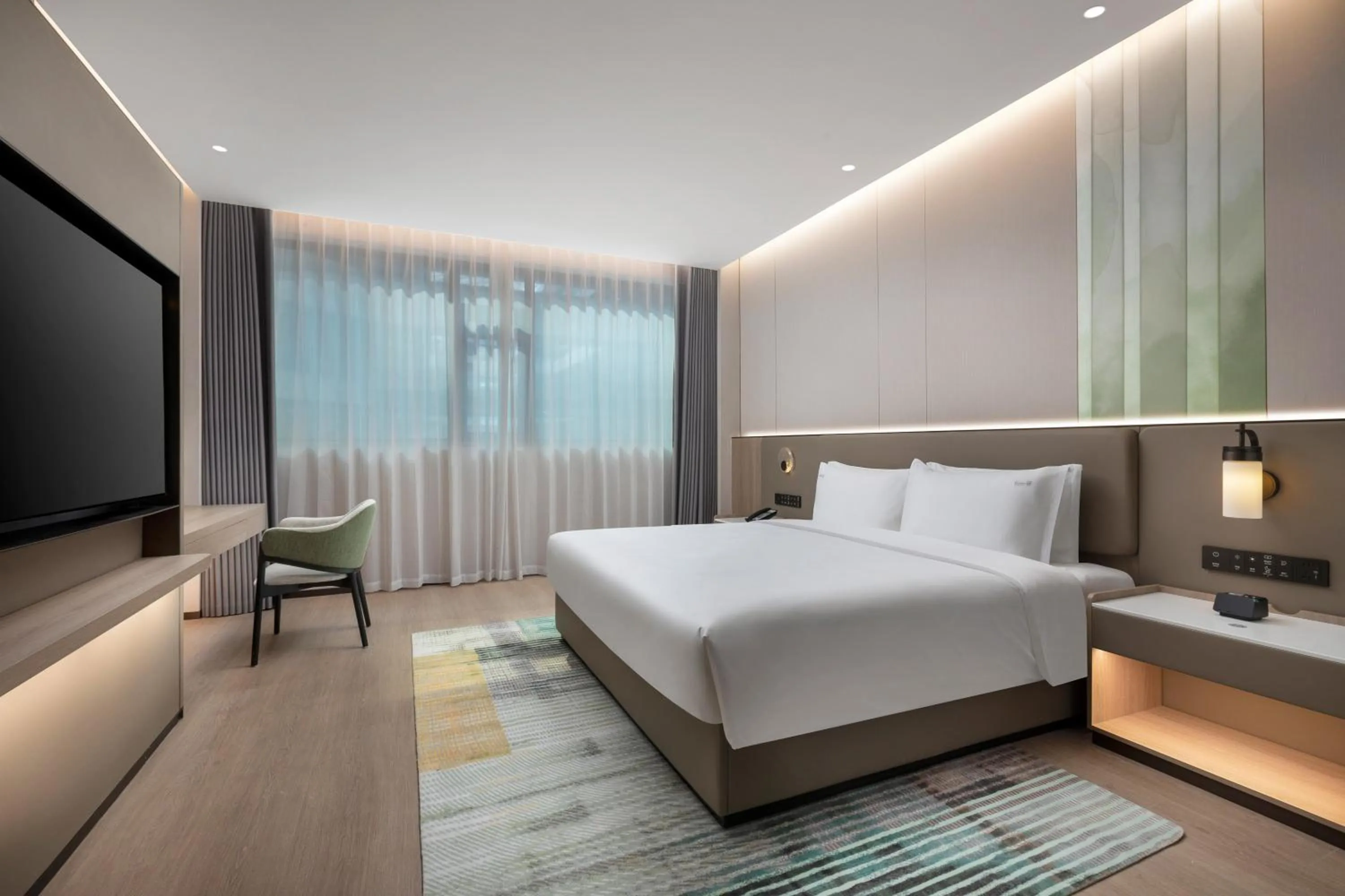 Bed in Holiday Inn & Suites Shanghai Changfeng by IHG