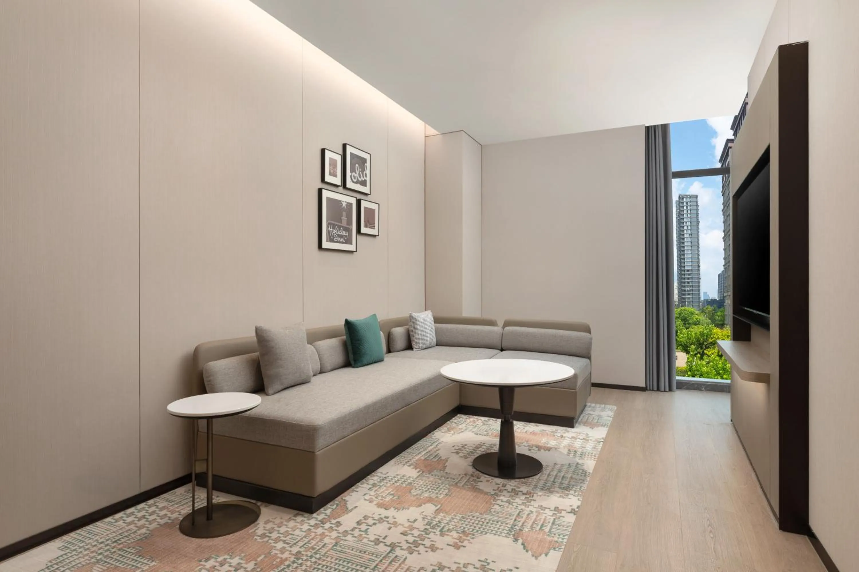 Living room in Holiday Inn & Suites Shanghai Changfeng by IHG