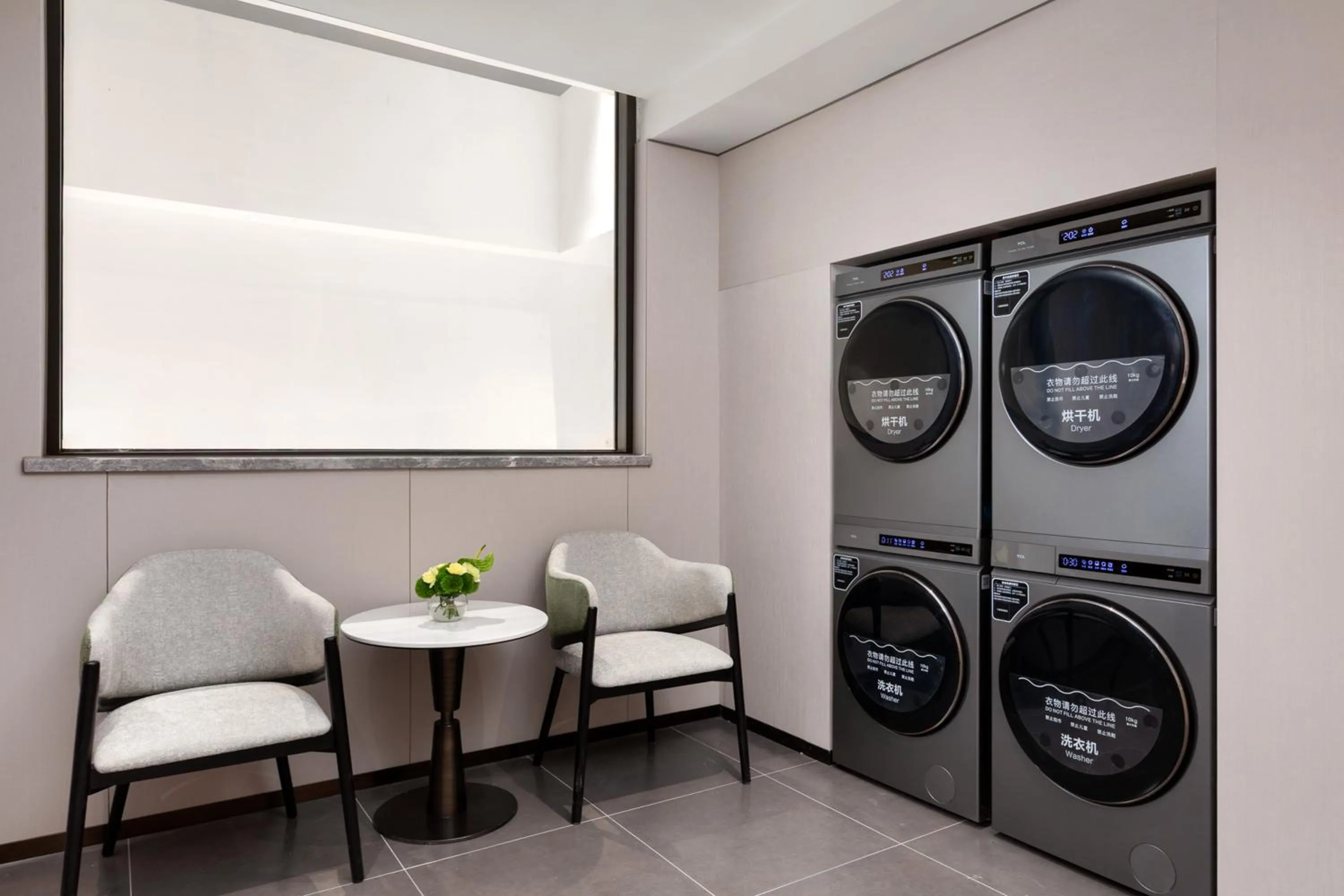 washing machine in Holiday Inn & Suites Shanghai Changfeng by IHG