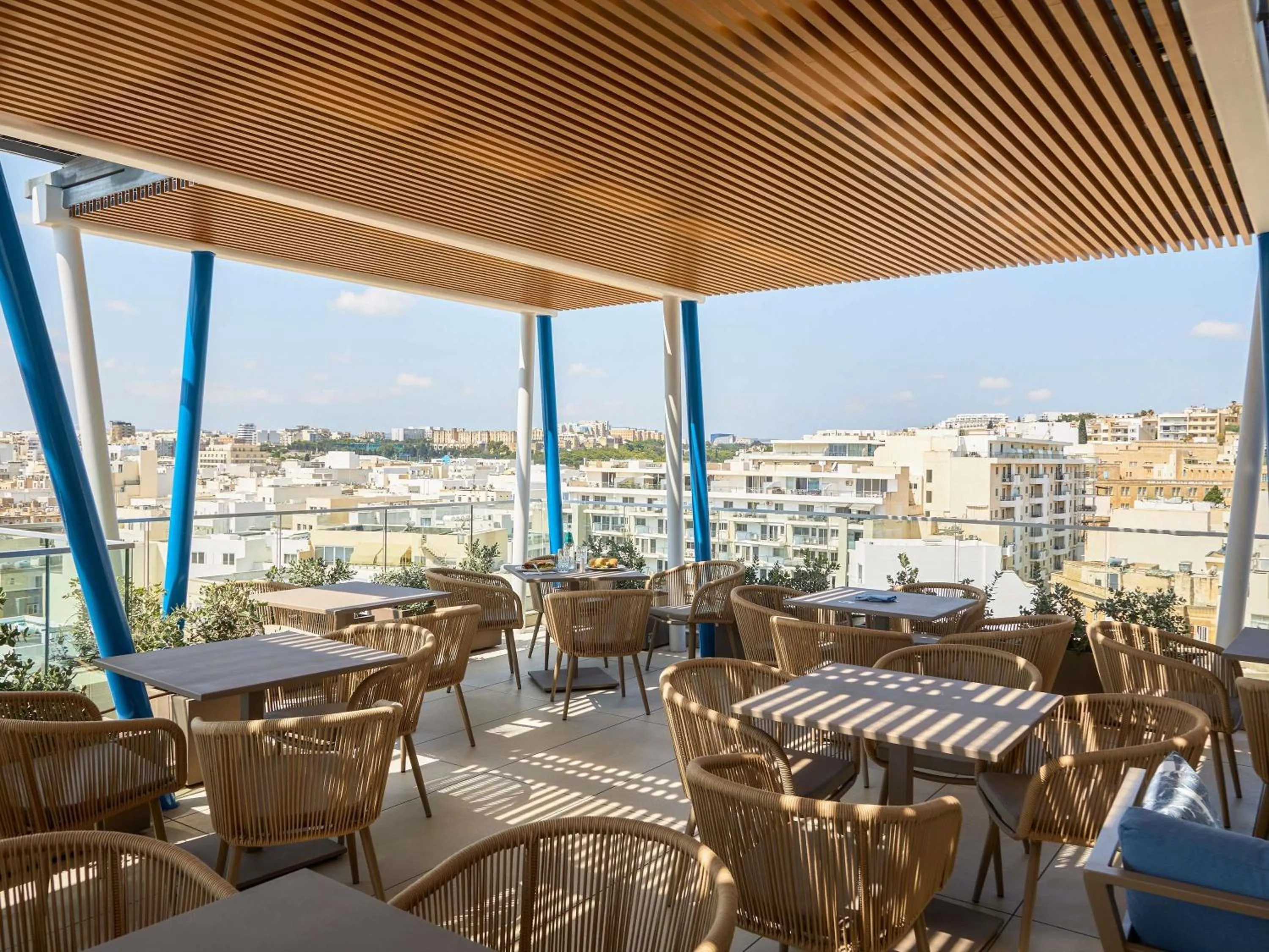 Lounge or bar in Novotel Malta Sliema