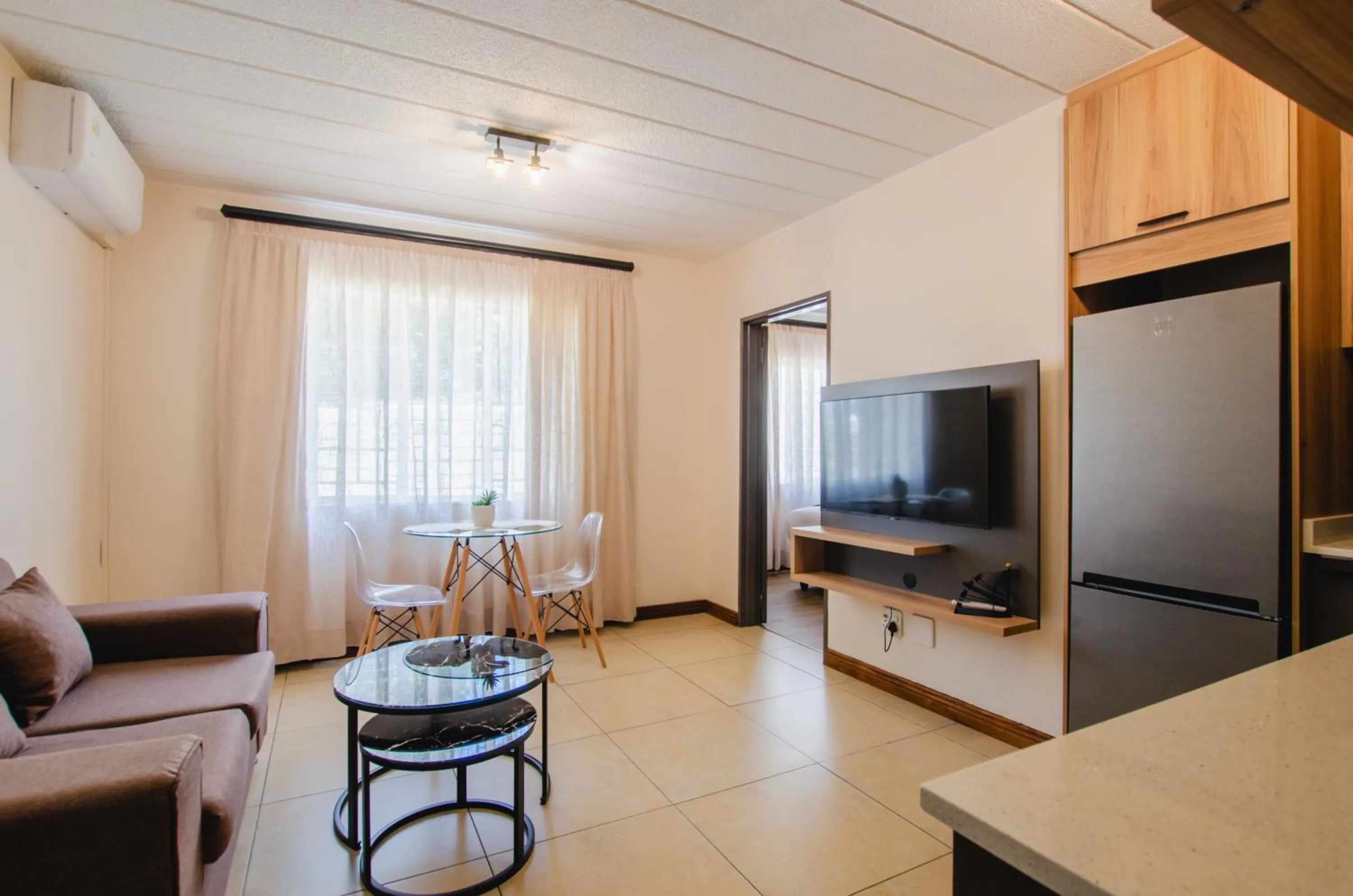 Communal lounge/ TV room in Melrose Corner Self-Catering Hotel Apartments