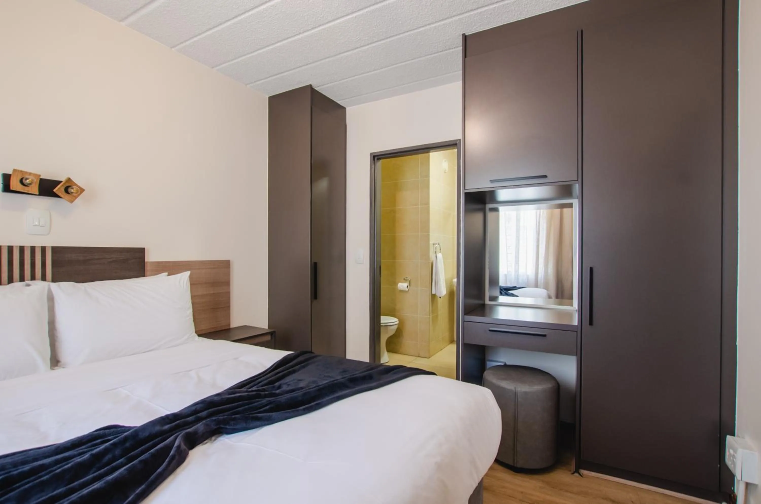 Bed in Melrose Corner Self-Catering Hotel Apartments