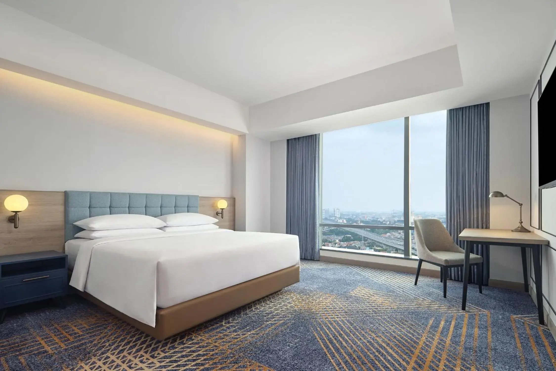 Premier King Suite with Skyline View in Four Points by Sheraton Bekasi Premier King Suite with Skyline View in Four Points by Sheraton Bekasi