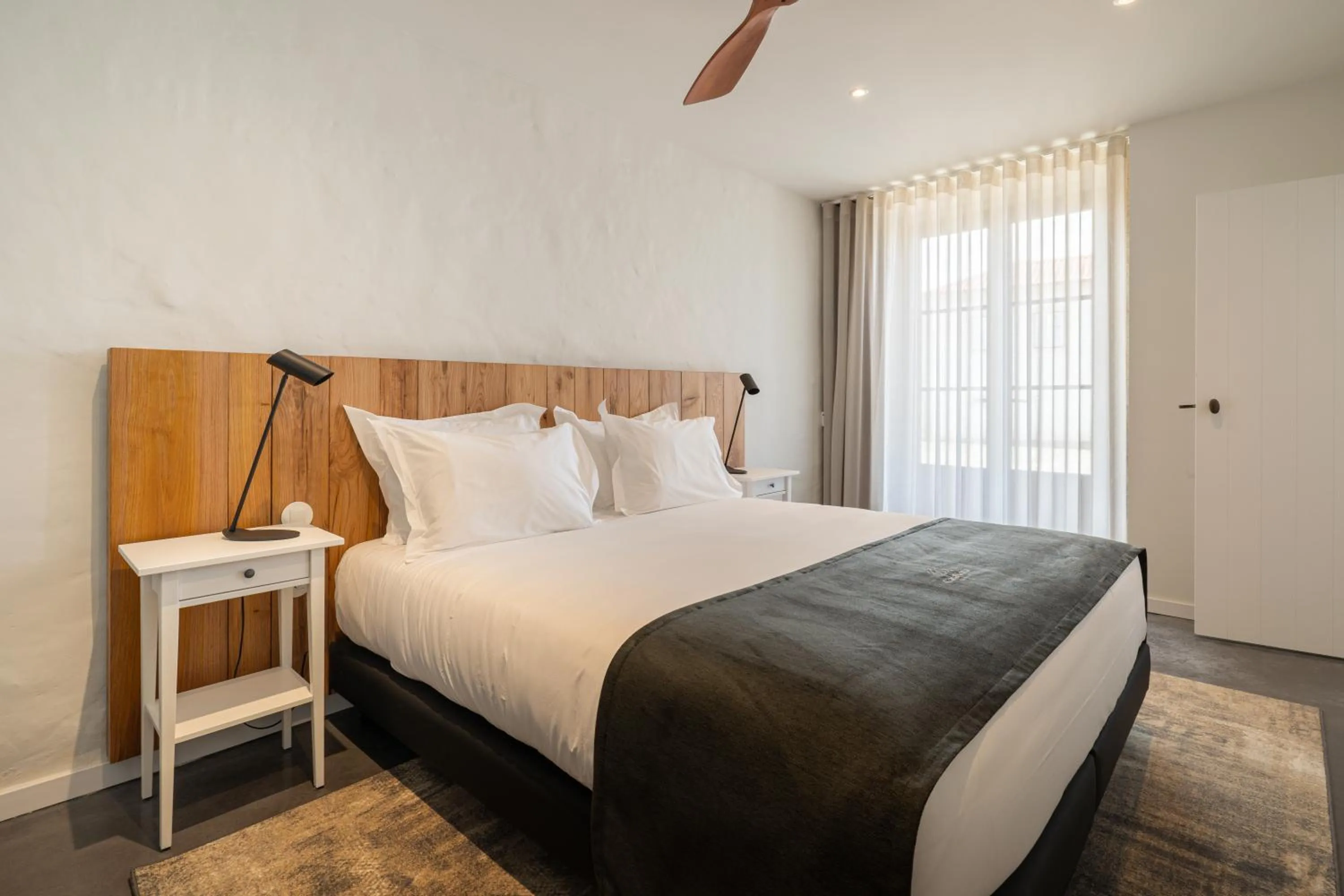 Bed in CasaNova Farmhouse