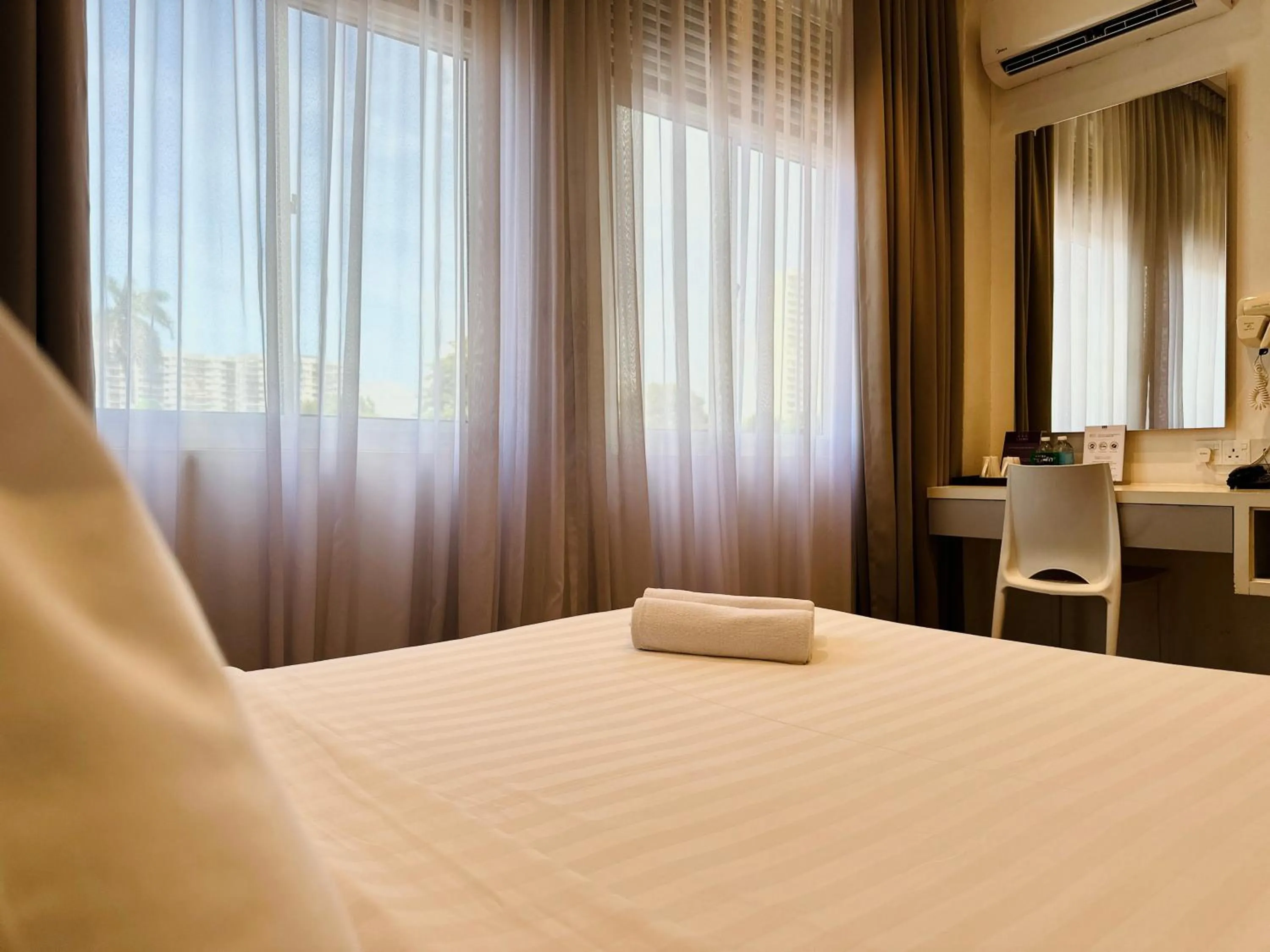 Bed in C Y C Heritage Hotel