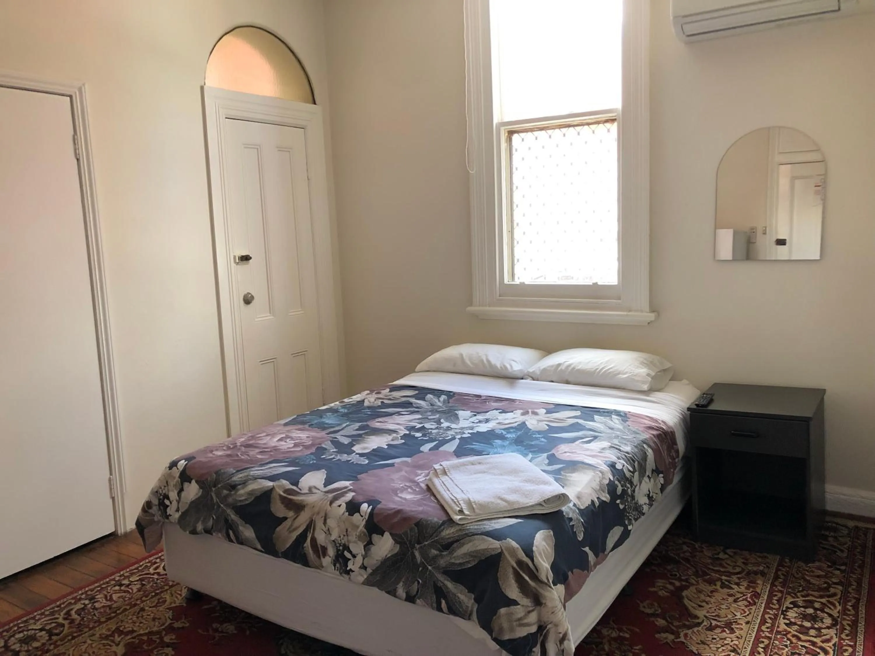 Bed in Northlodge Central City Apartments