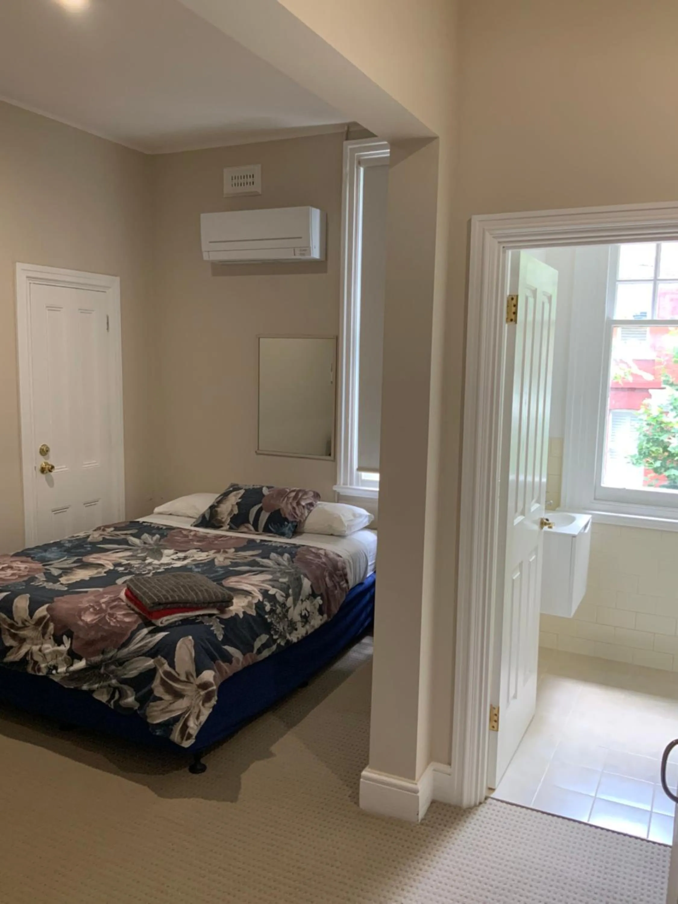 Bed in Northlodge Central City Apartments