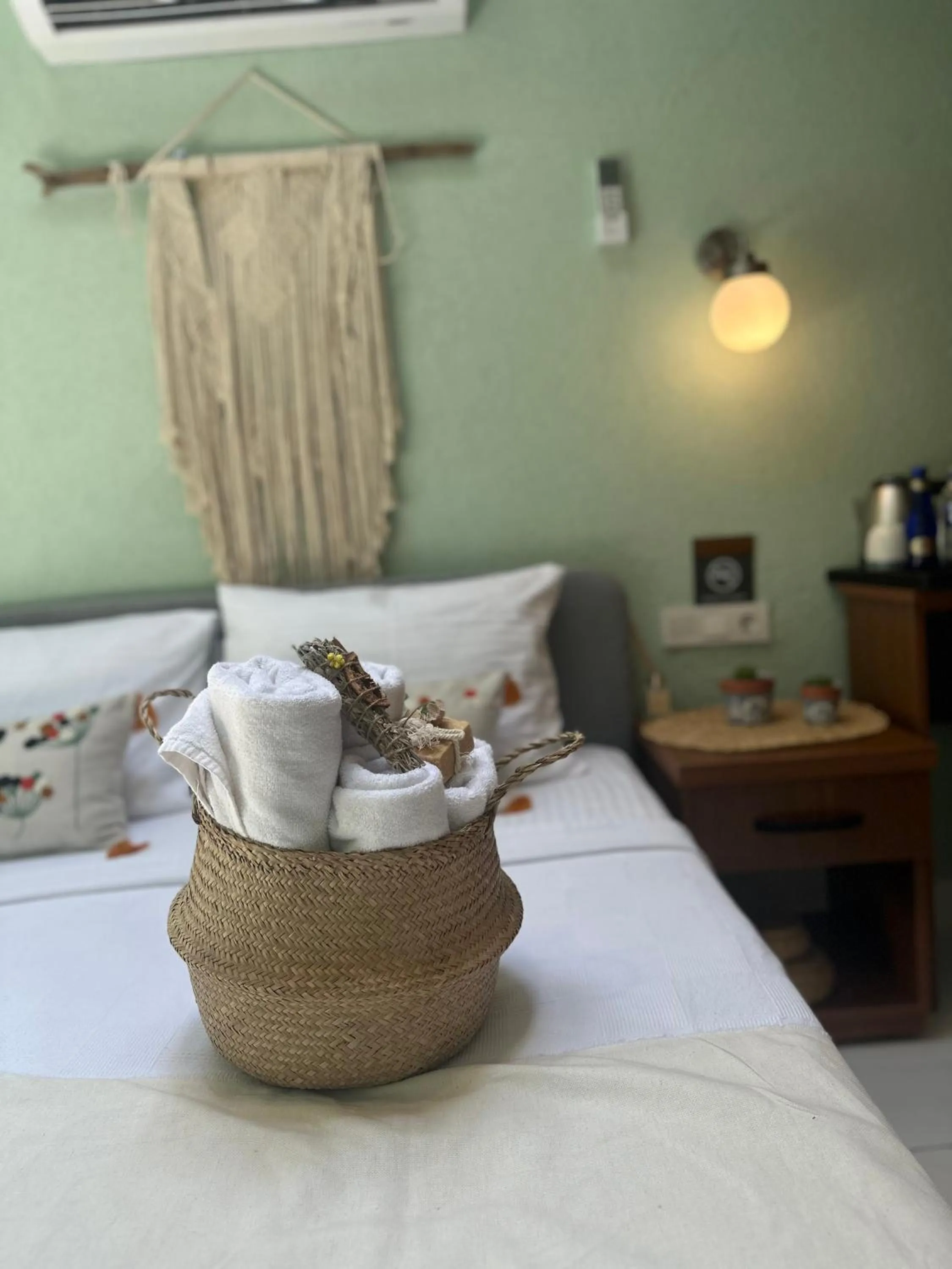 towels, Bed in Hanole Macaron Guest House
