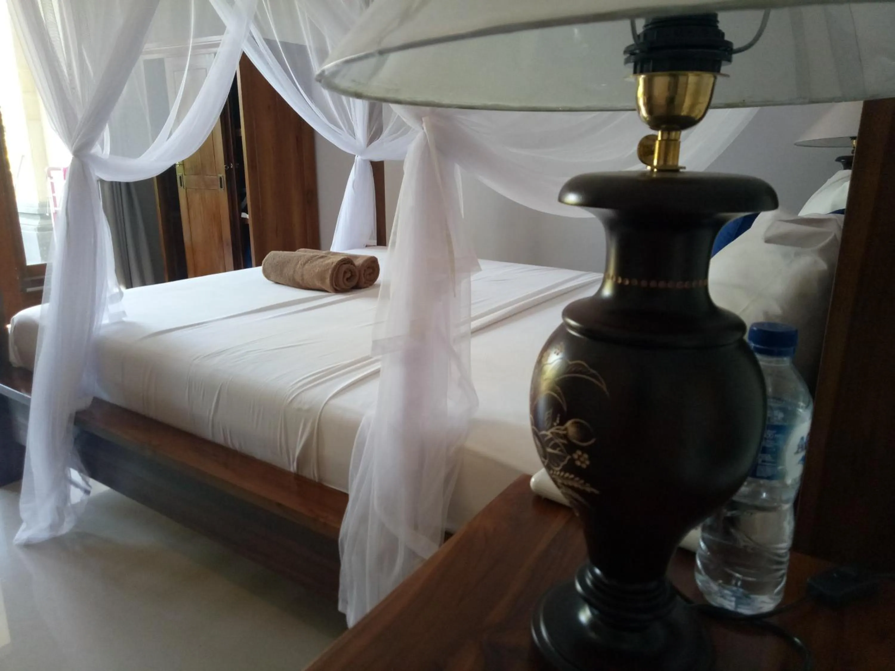 Bed in Suryadina Guest House