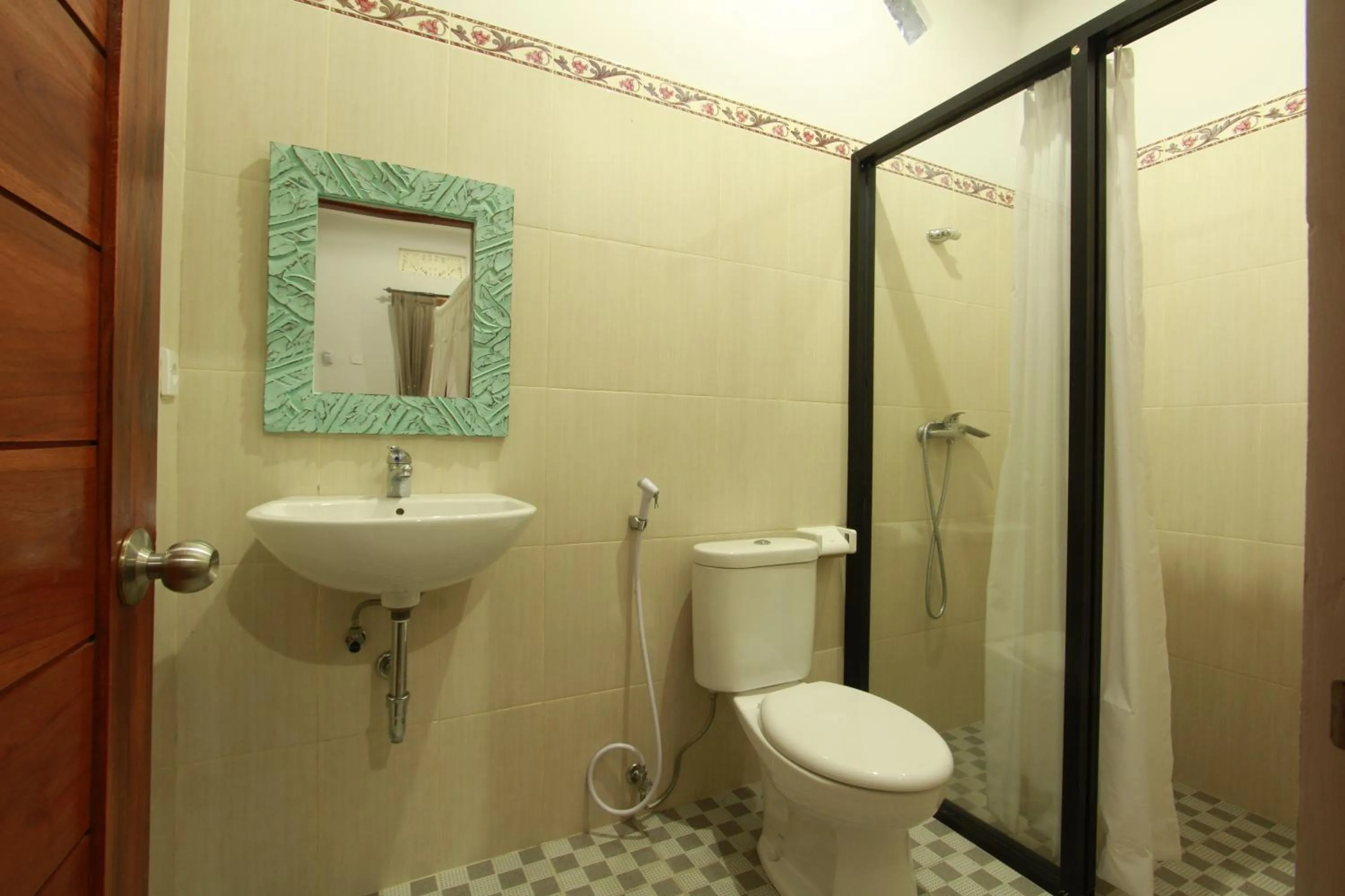 Bathroom in Suryadina Guest House