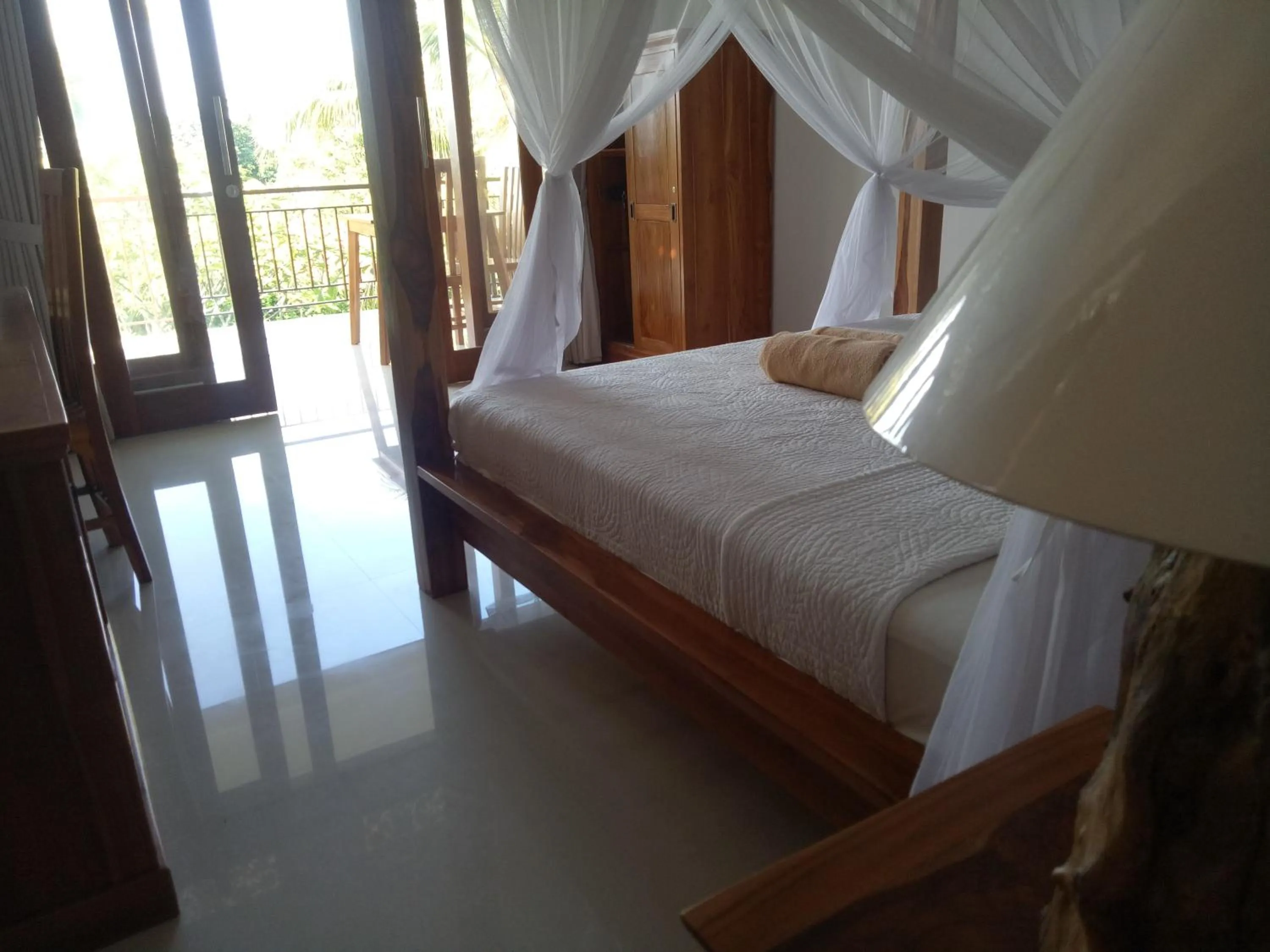 Bed in Suryadina Guest House