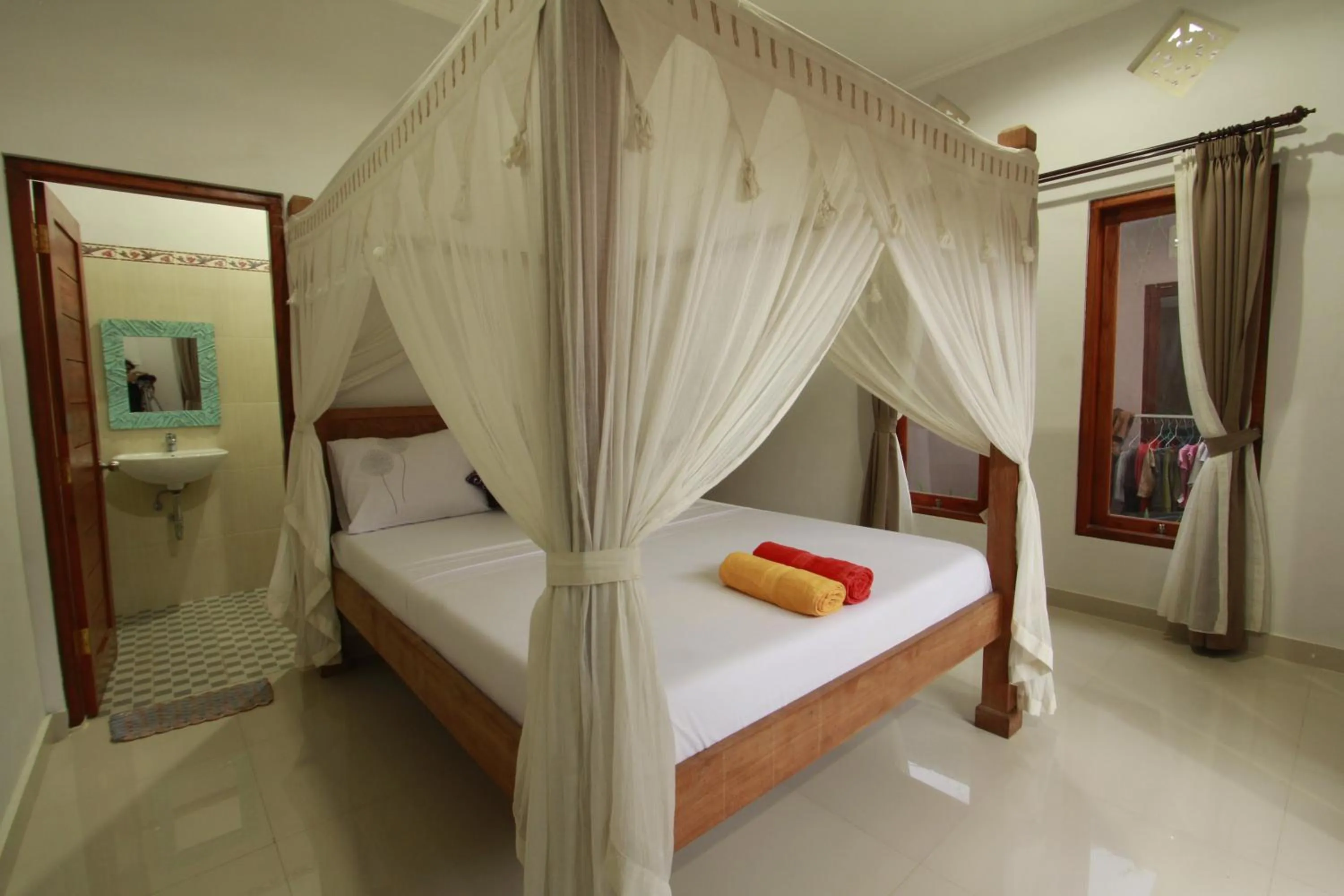 Bedroom, Bed in Suryadina Guest House