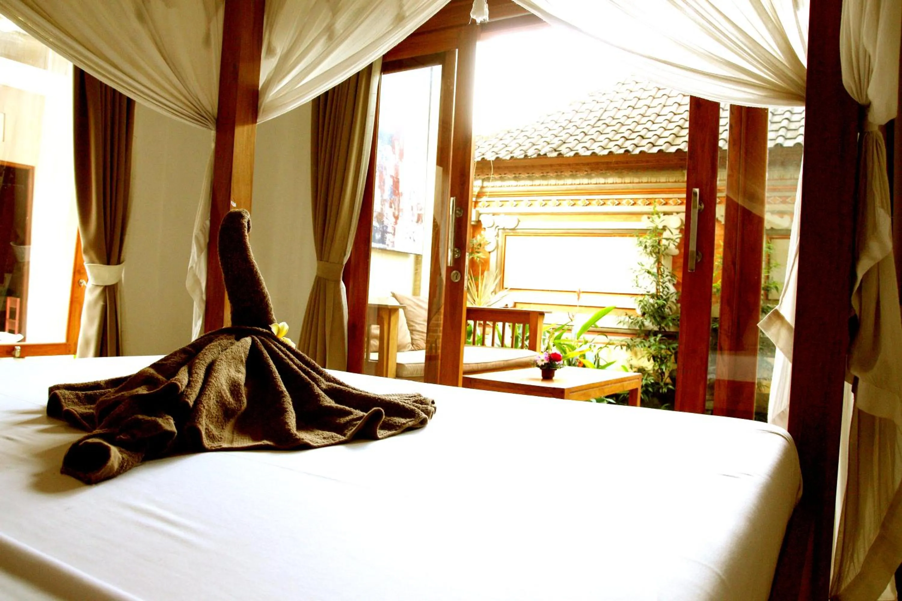 Photo of the whole room, Bed in Suryadina Guest House