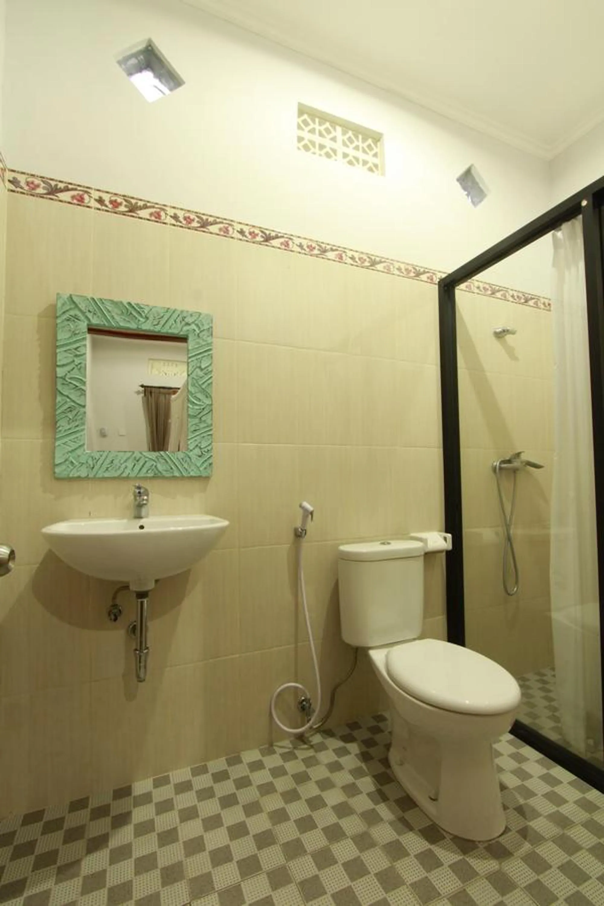 Bathroom in Suryadina Guest House