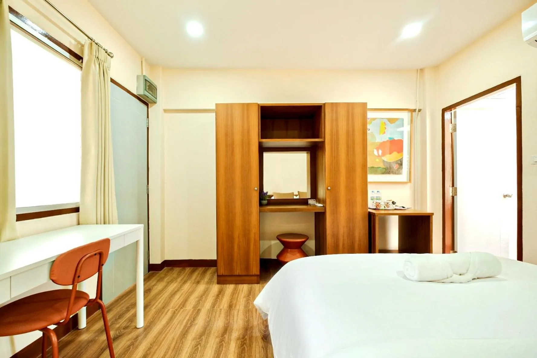 Bed in Thong Poon Apartment Chiang Mai