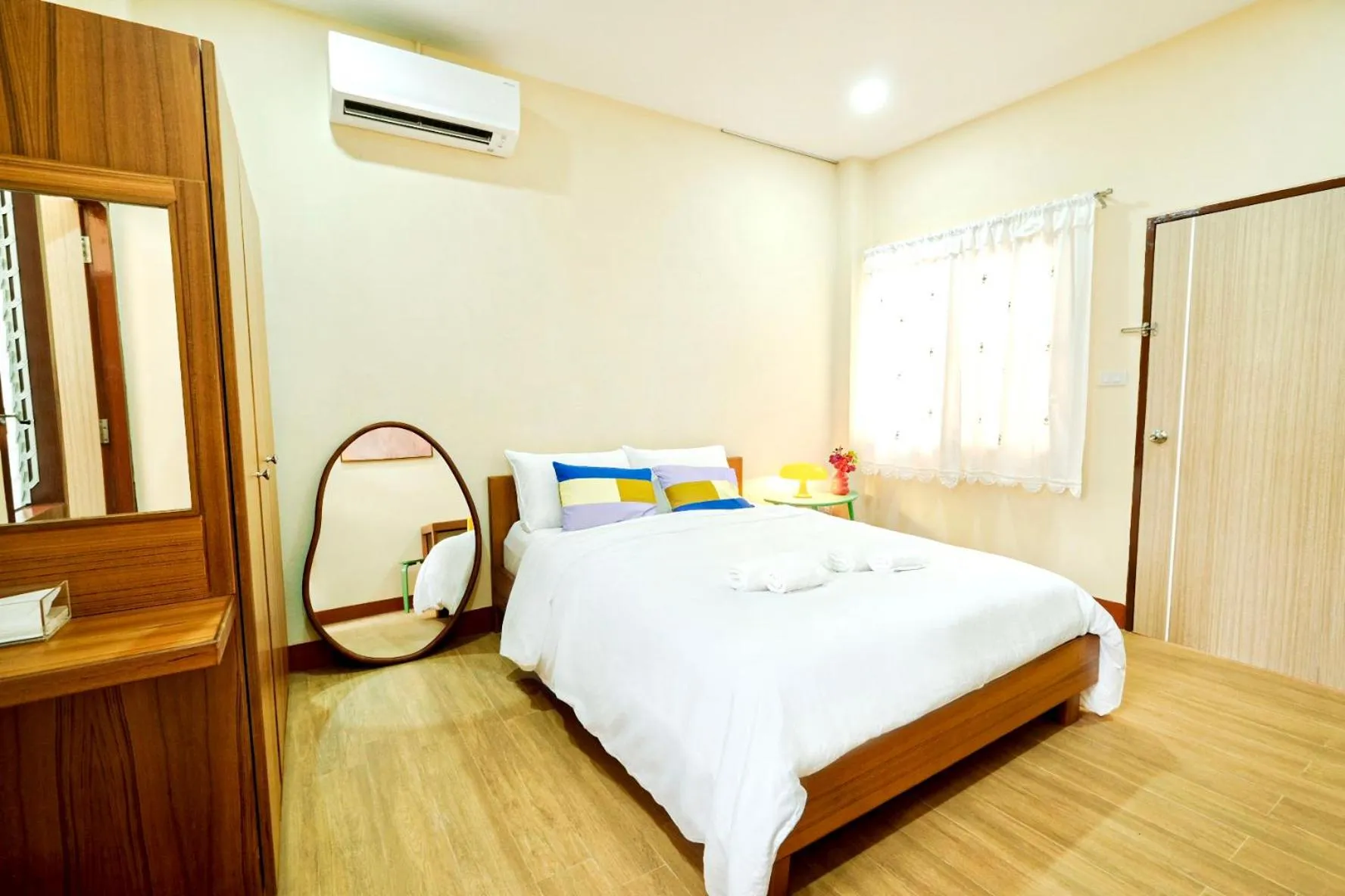 Bed in Thong Poon Apartment Chiang Mai