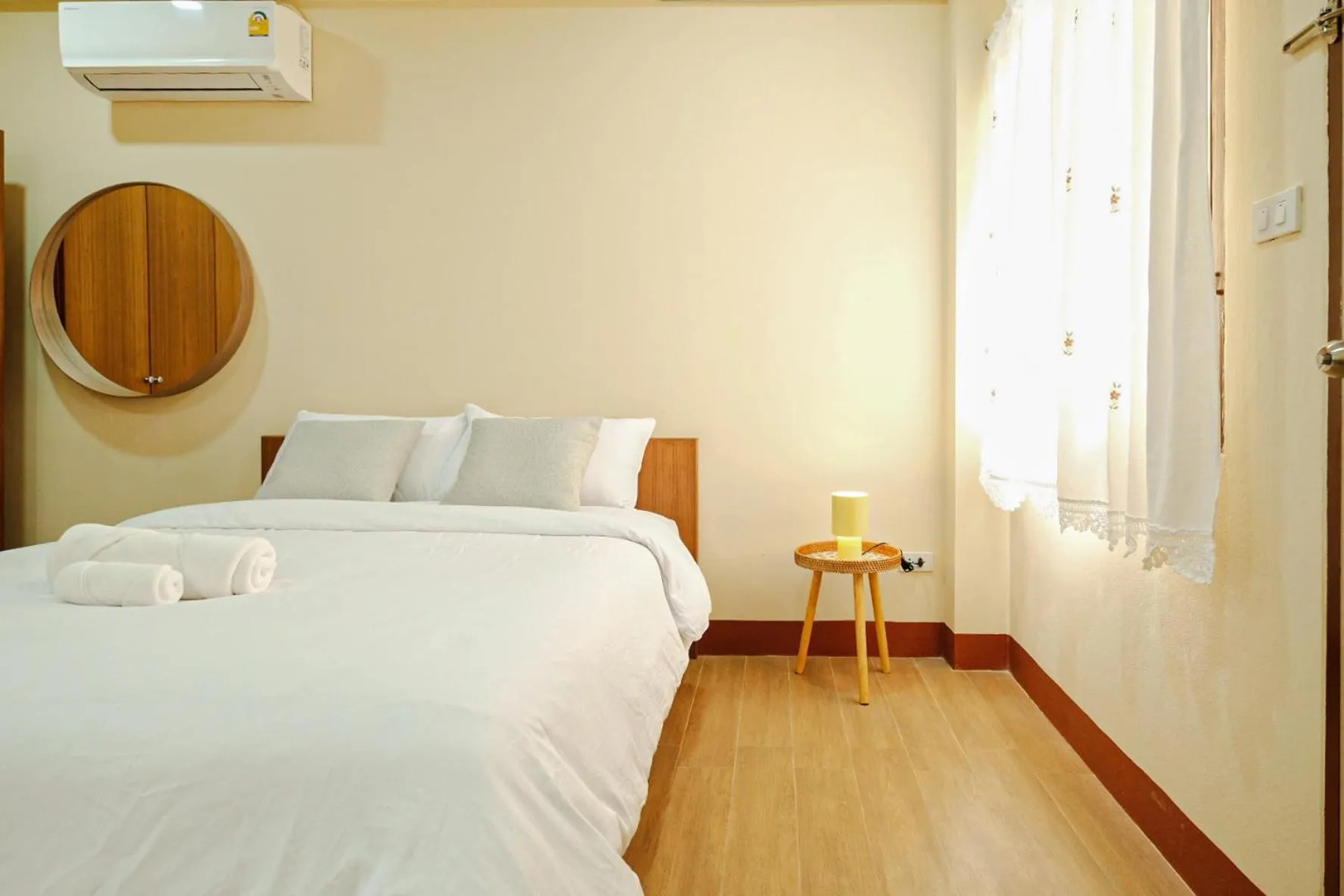 Bed in Thong Poon Apartment Chiang Mai