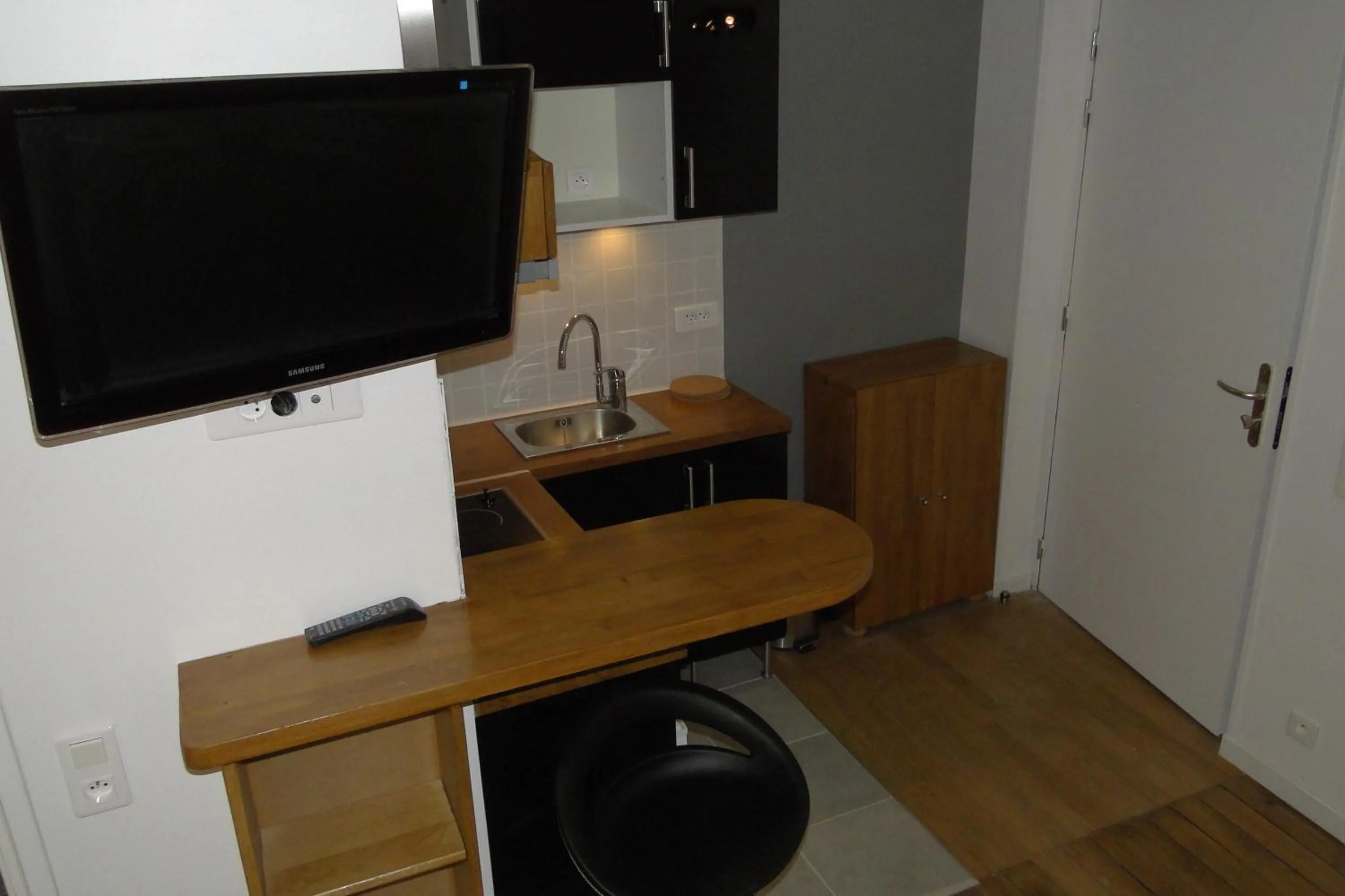 Decorative detail, TV/Entertainment Center in Salvy Residence