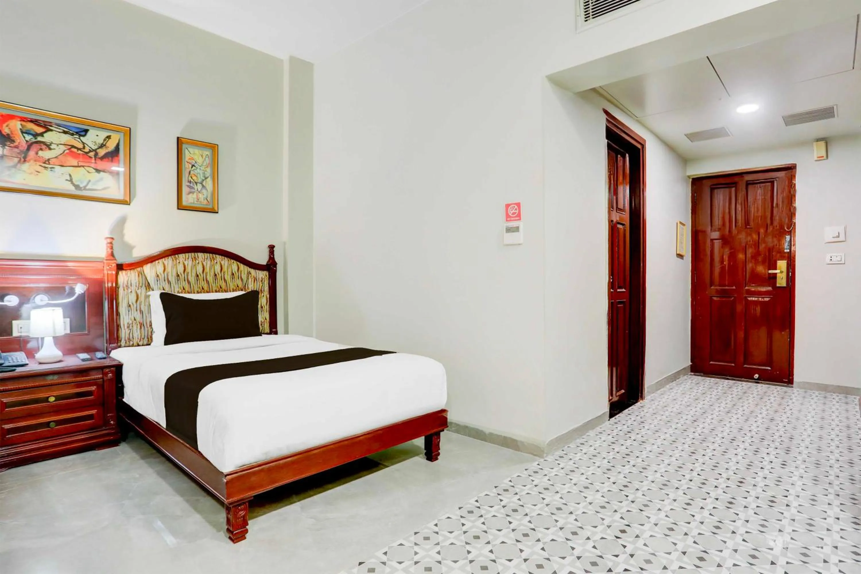 Classic Triple Room - single occupancy in Collection O Gujarat Anand City Bus Station
