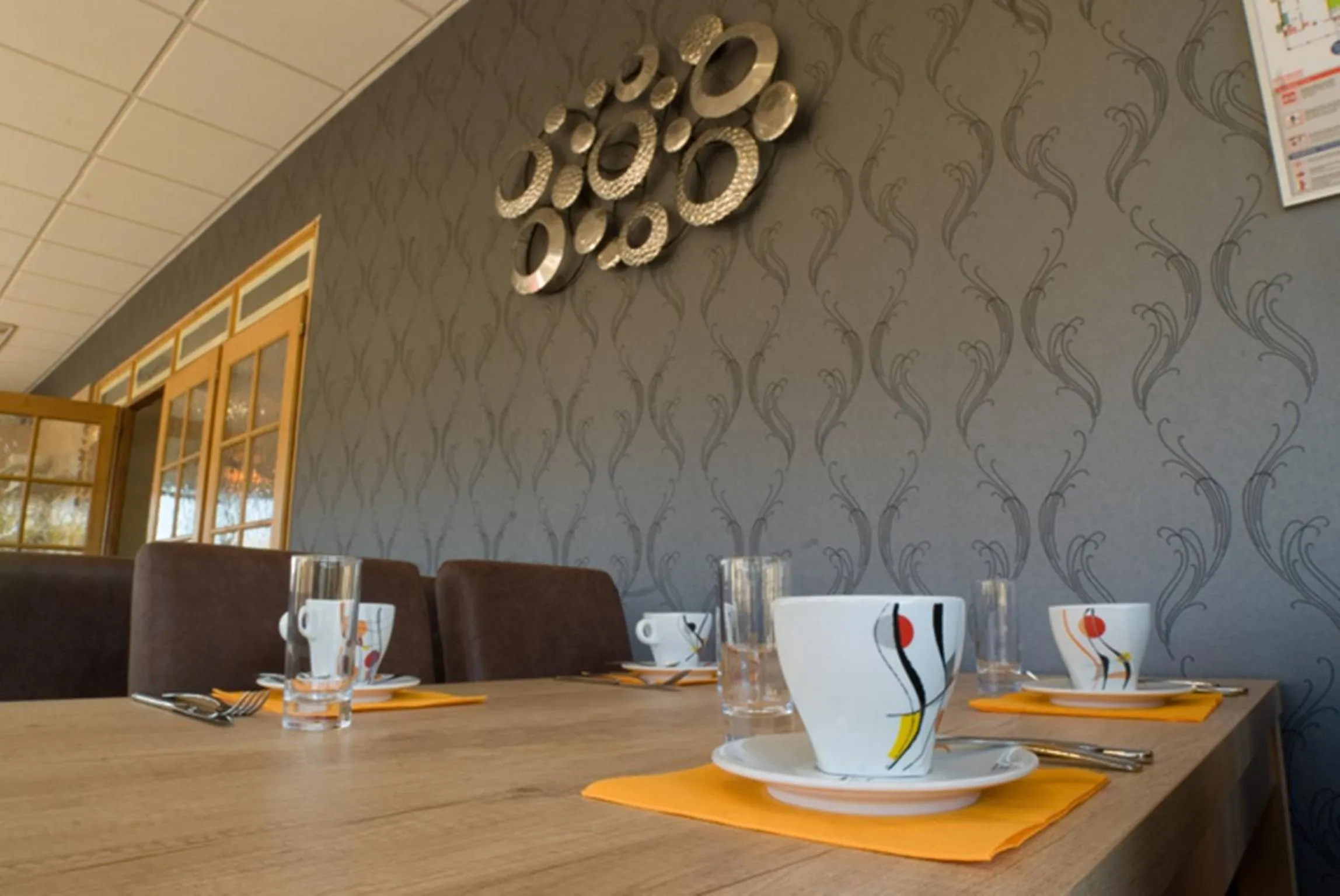 Kitchen or kitchenette in Logis Hotel Restaurant de La Madeleine