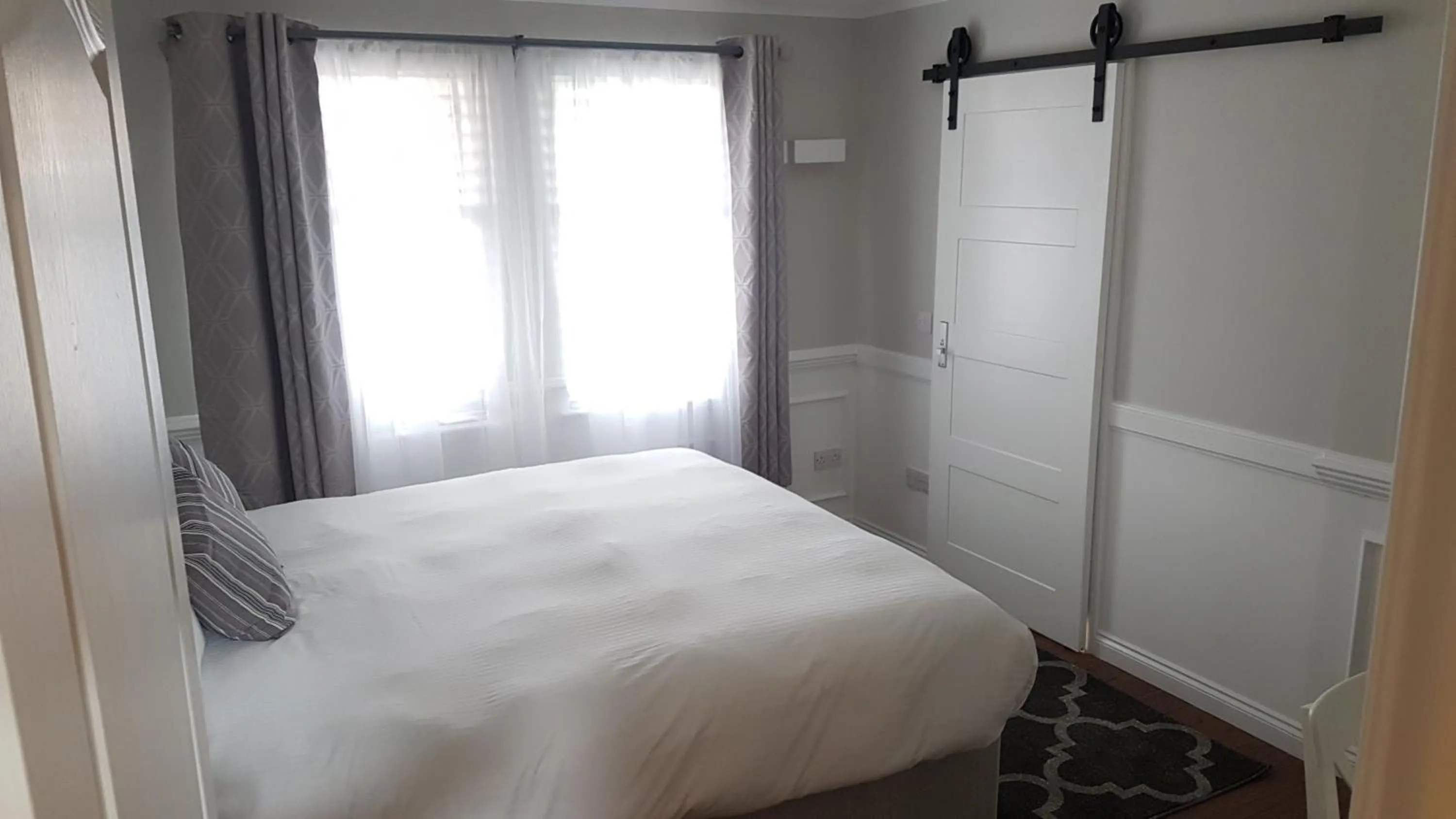 Bed in MacLean Guest House