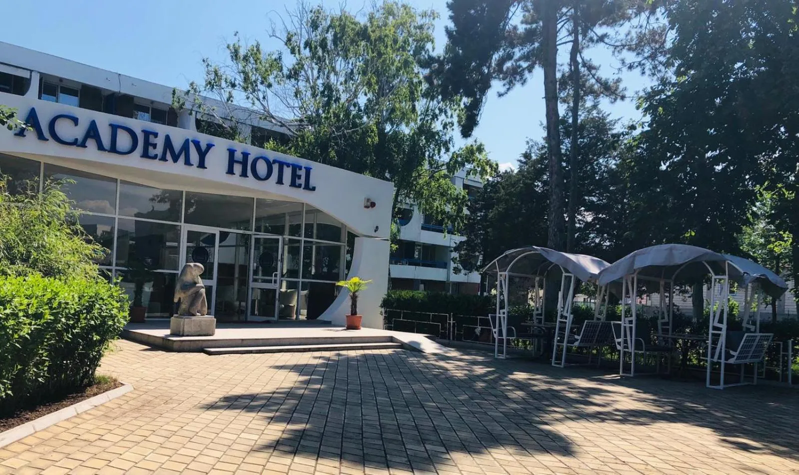 Property logo or sign in Academy Hotel