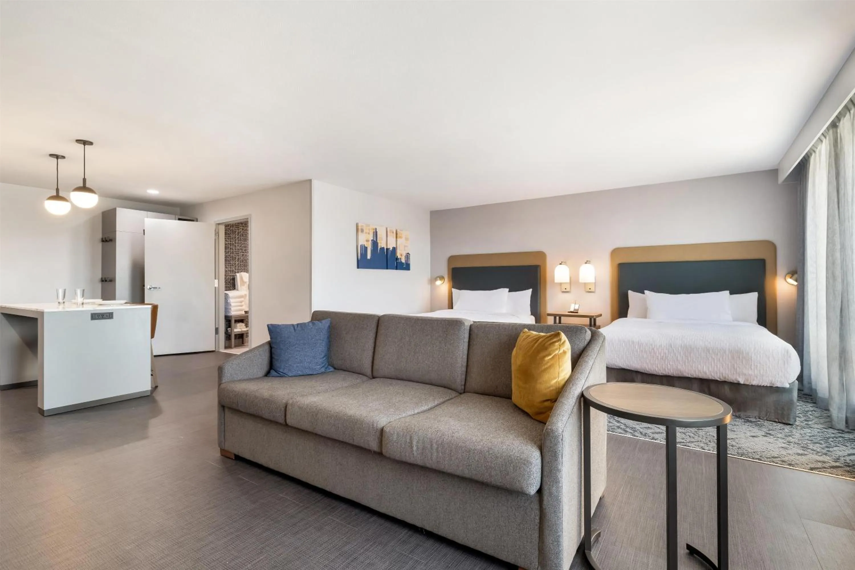 Living room, Bed in Homewood Suites By Hilton Austin Airport