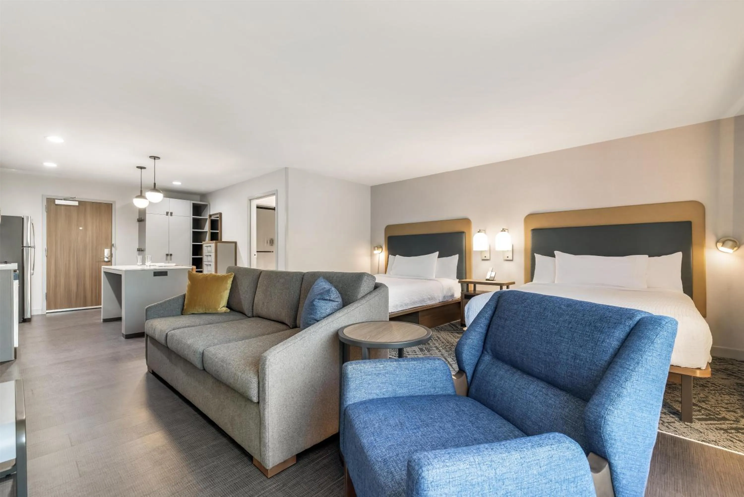 Living room, Bed in Homewood Suites By Hilton Austin Airport