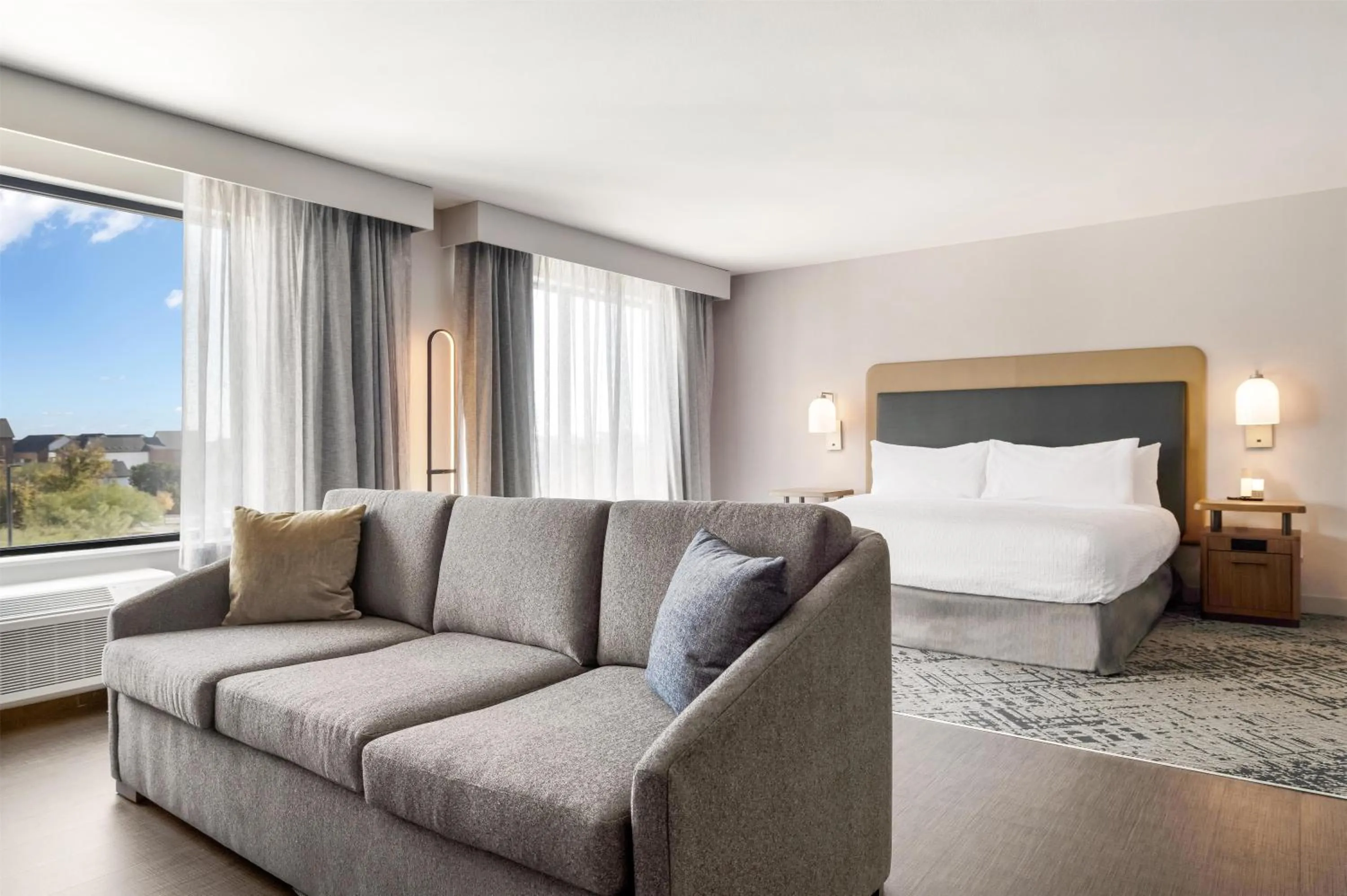 Living room, Bed in Homewood Suites By Hilton Austin Airport