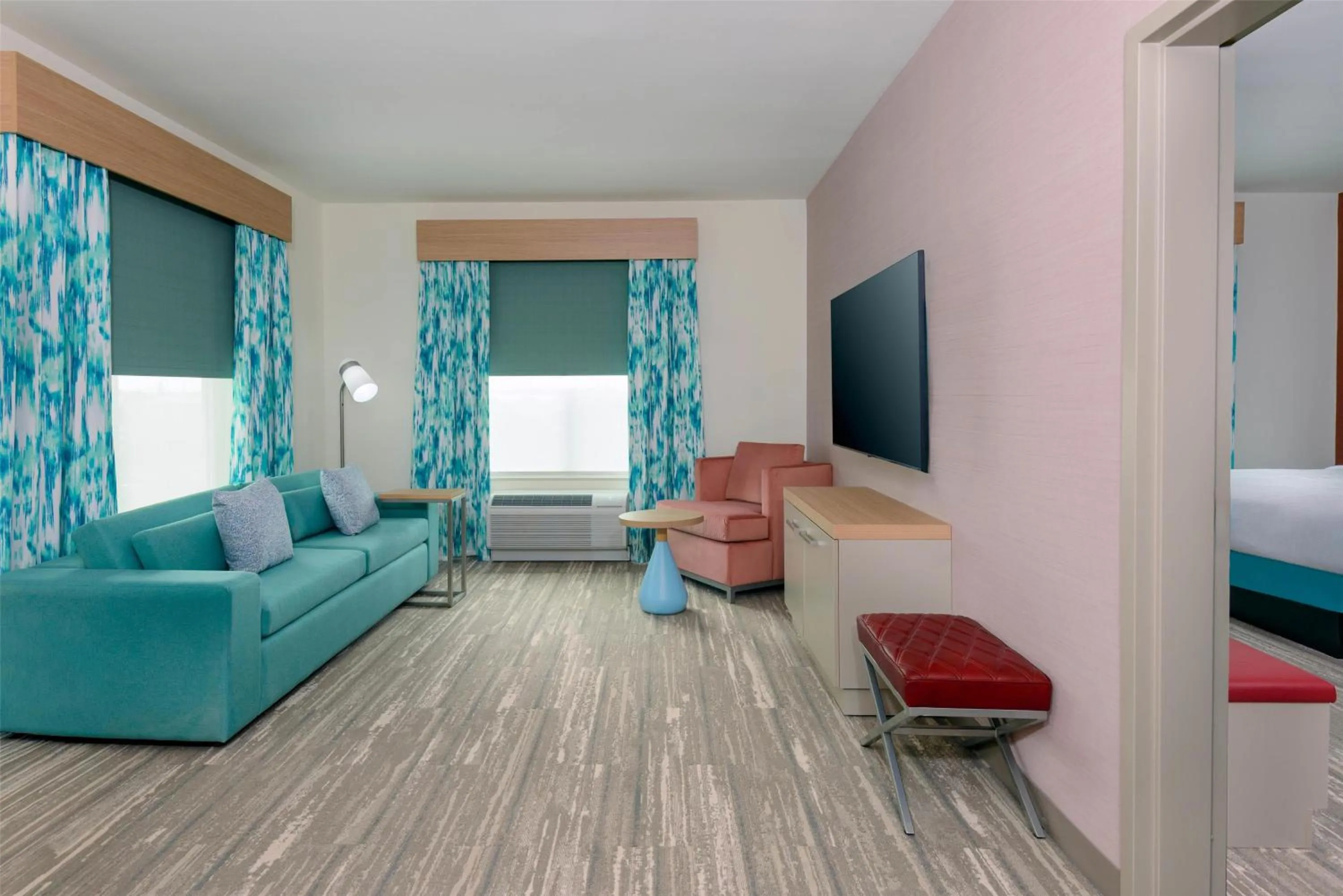 Living room, Bed in Hilton Garden Inn Cape Canaveral Near Cocoa Beach