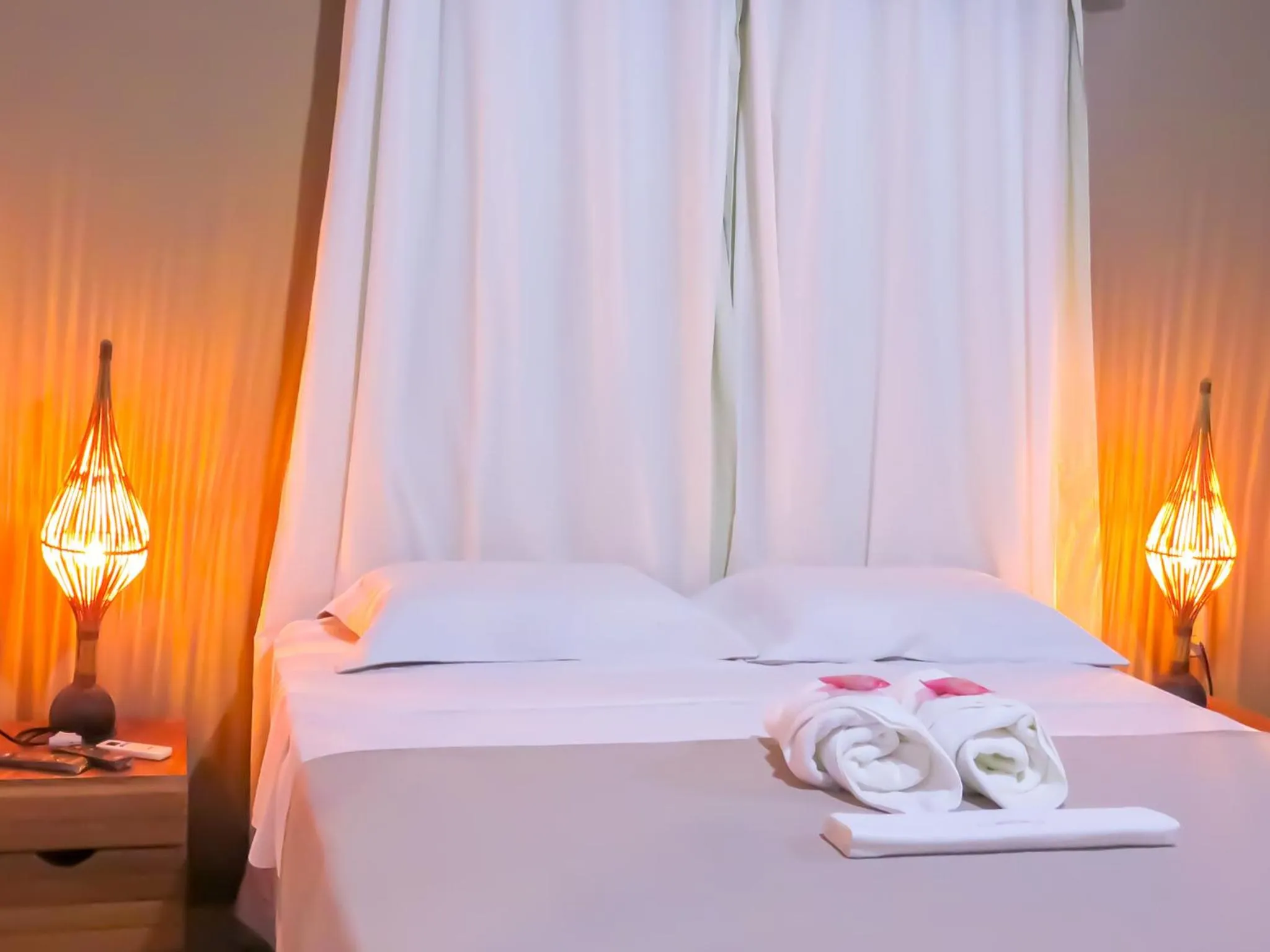 Bed in Pousada Das Roseiras