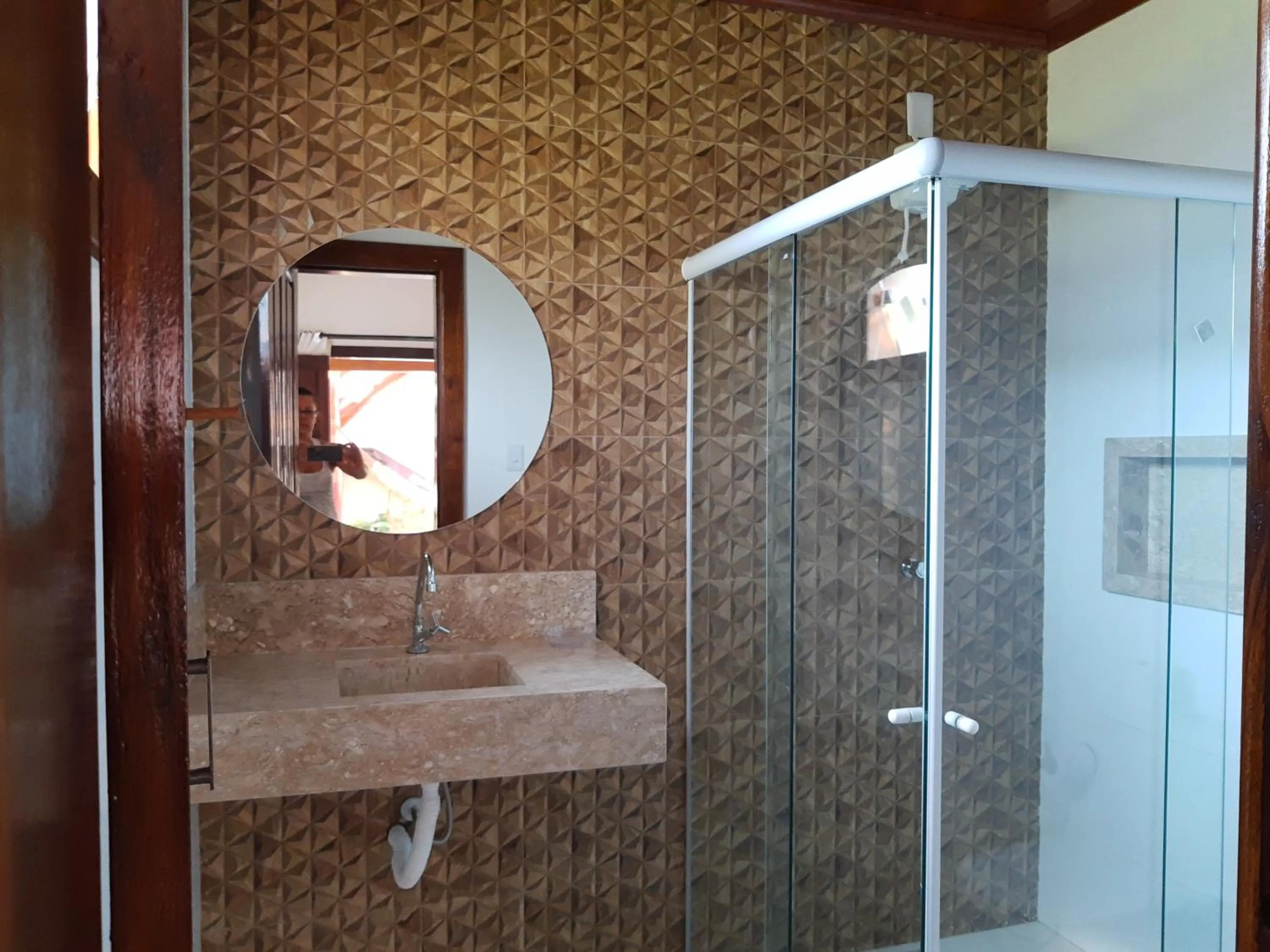 Bathroom in Pousada Das Roseiras