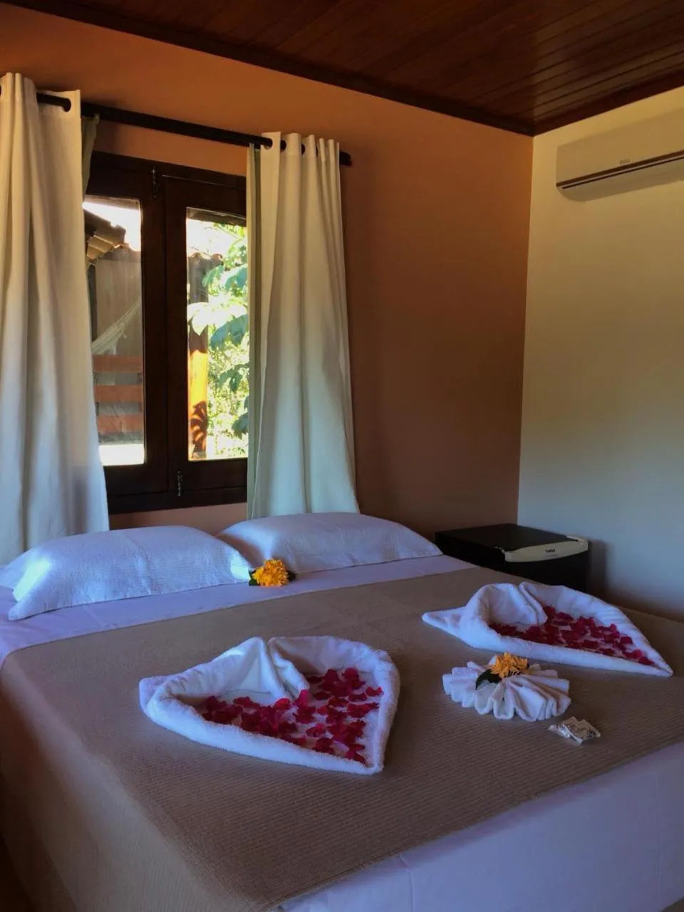 Bed in Pousada Das Roseiras