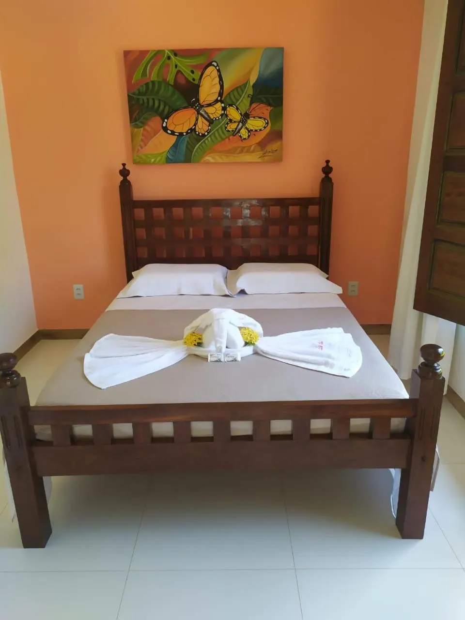 Bed in Pousada Das Roseiras