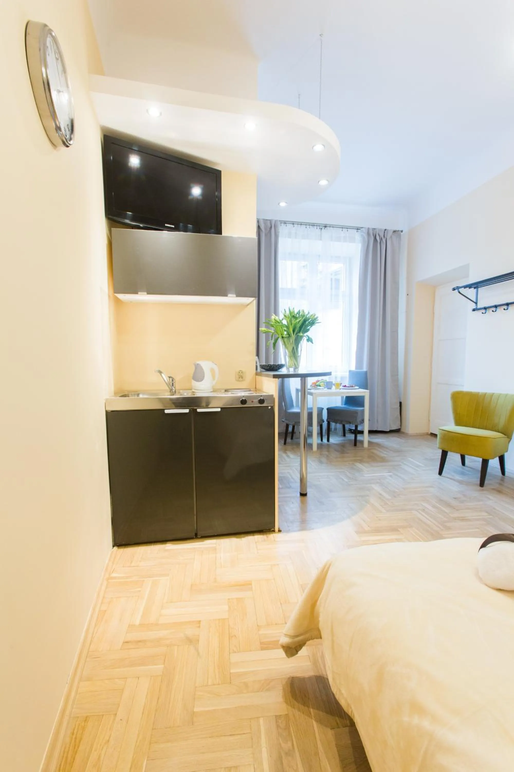 Kitchen or kitchenette, Bed in Apartments Roman