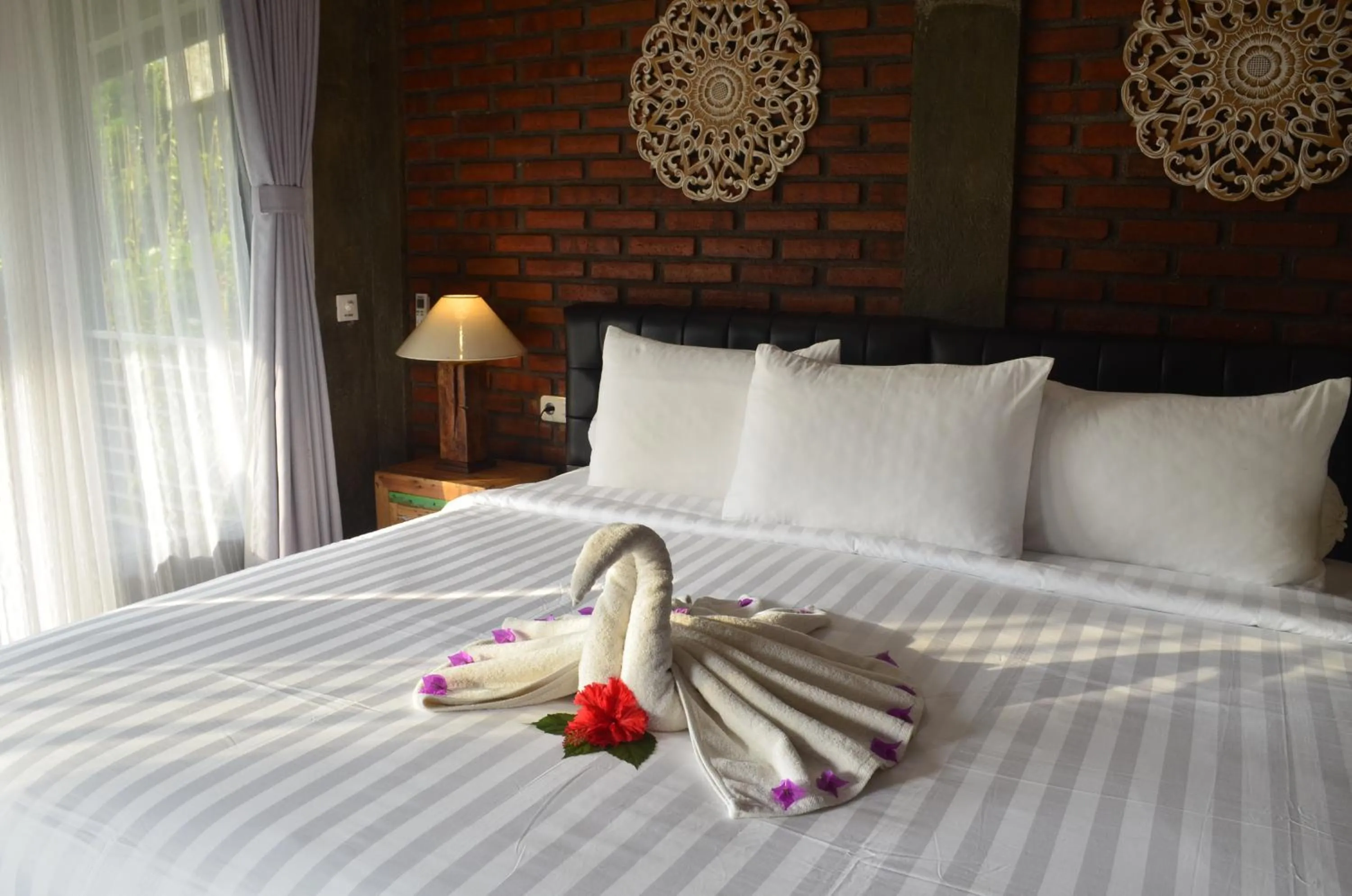 Bed in Alamanda Lovina Resort