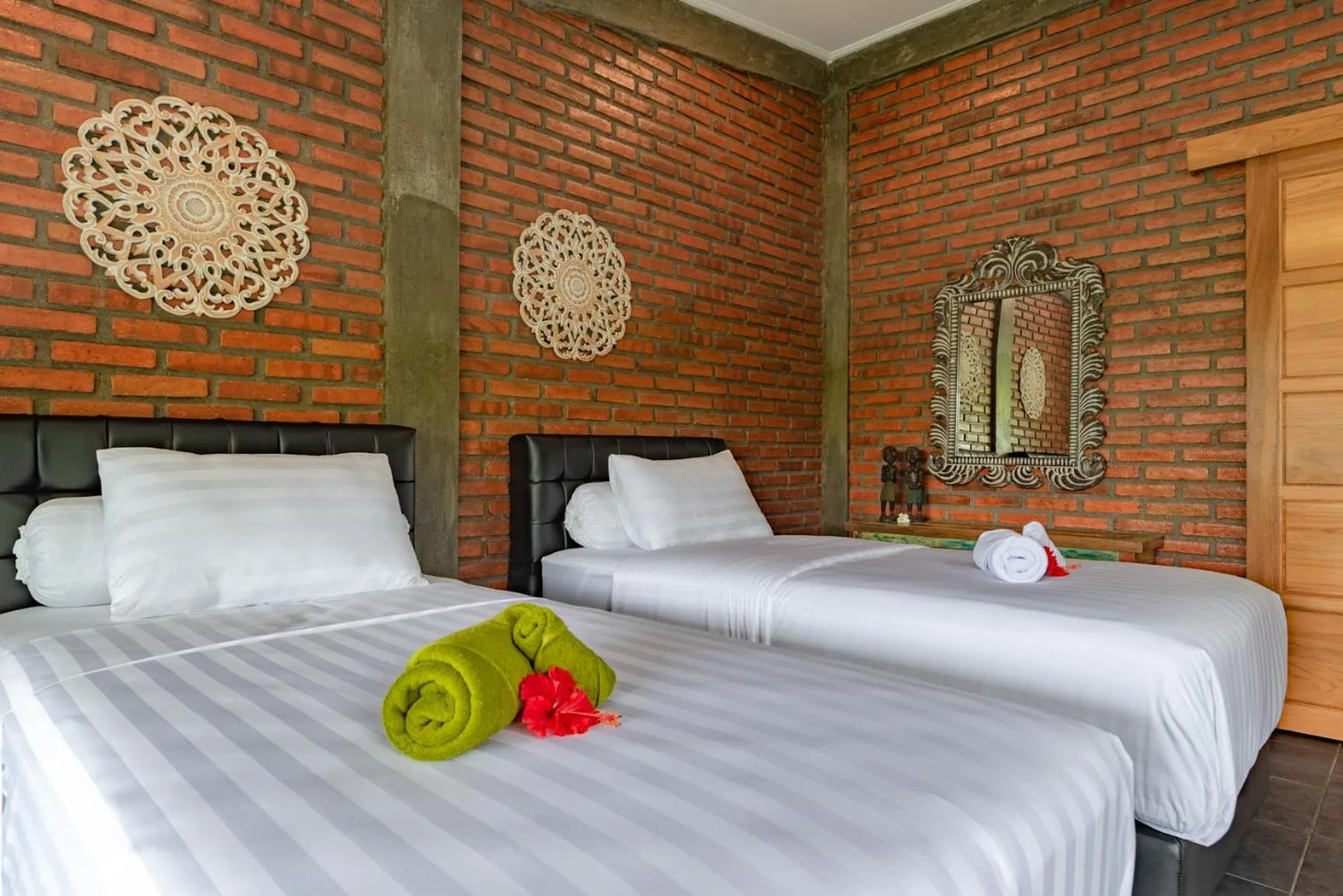 Bed in Alamanda Lovina Resort
