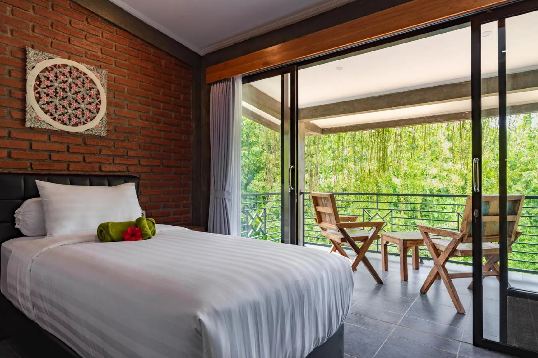 Bed in Alamanda Lovina Resort