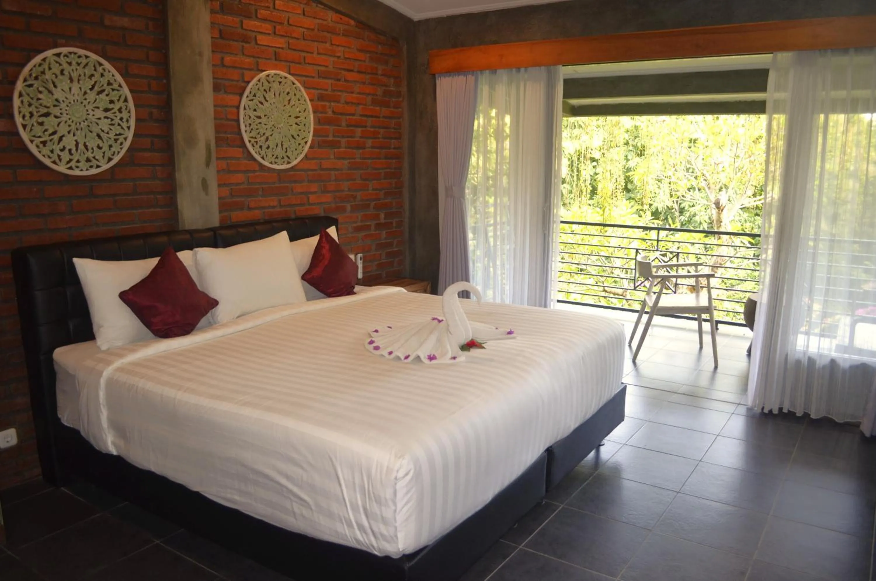 Bed in Alamanda Lovina Resort