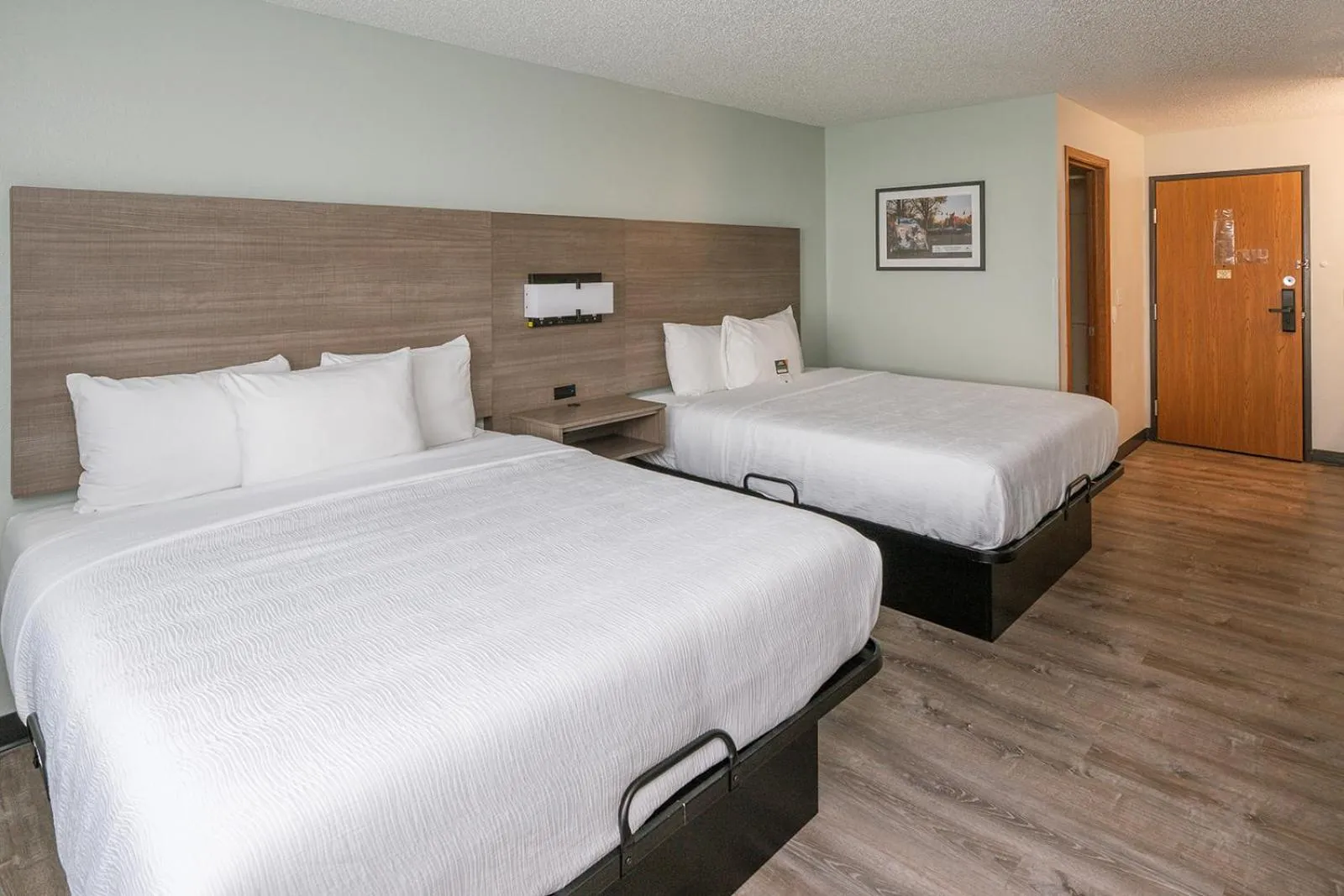 Bed in Hotel Pommier Chariton