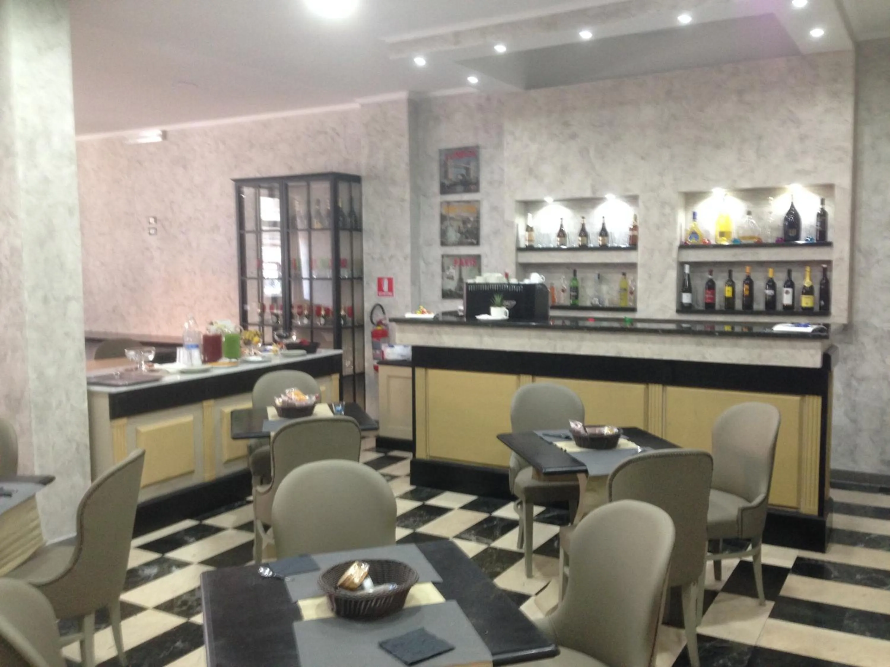 Communal lounge/ TV room in Maximo Hotel