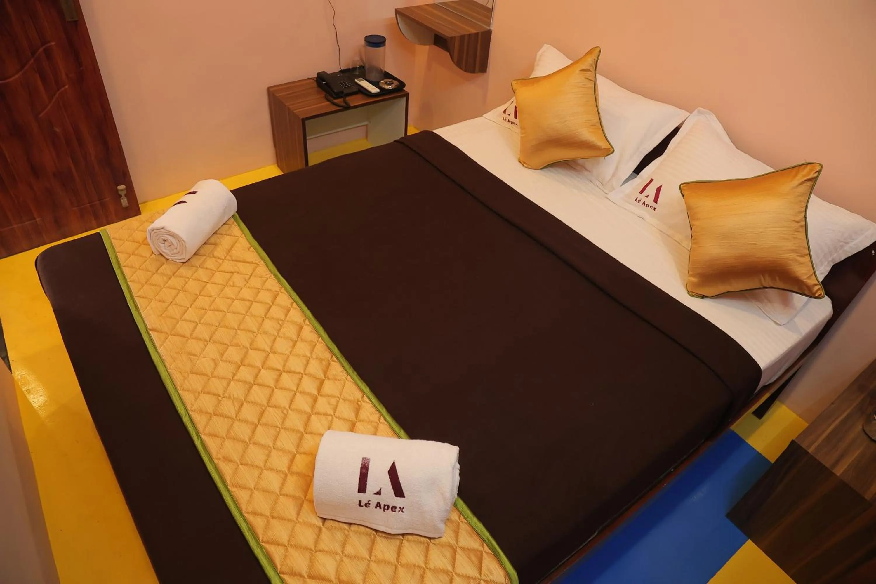 Bed in Le Apex Tharavaadu