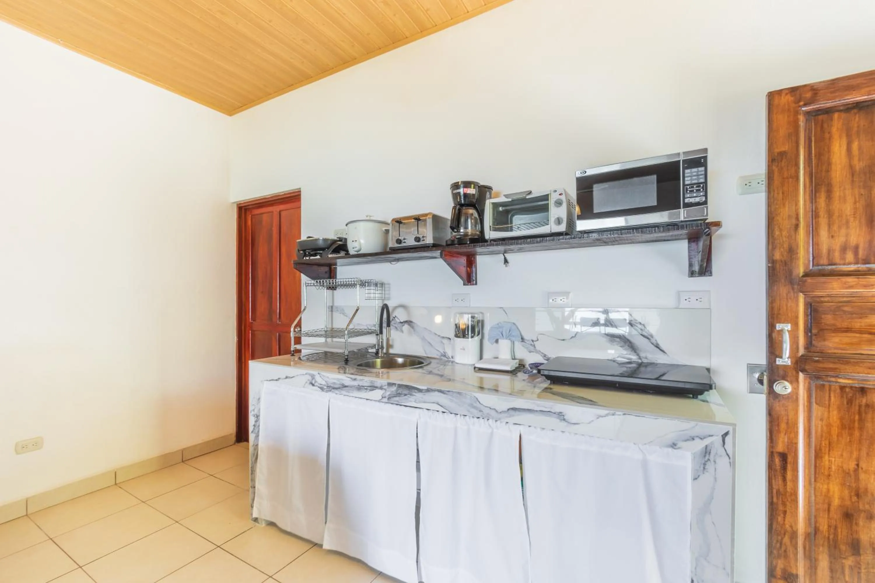 Kitchen or kitchenette in Hotel Villas de la Selva