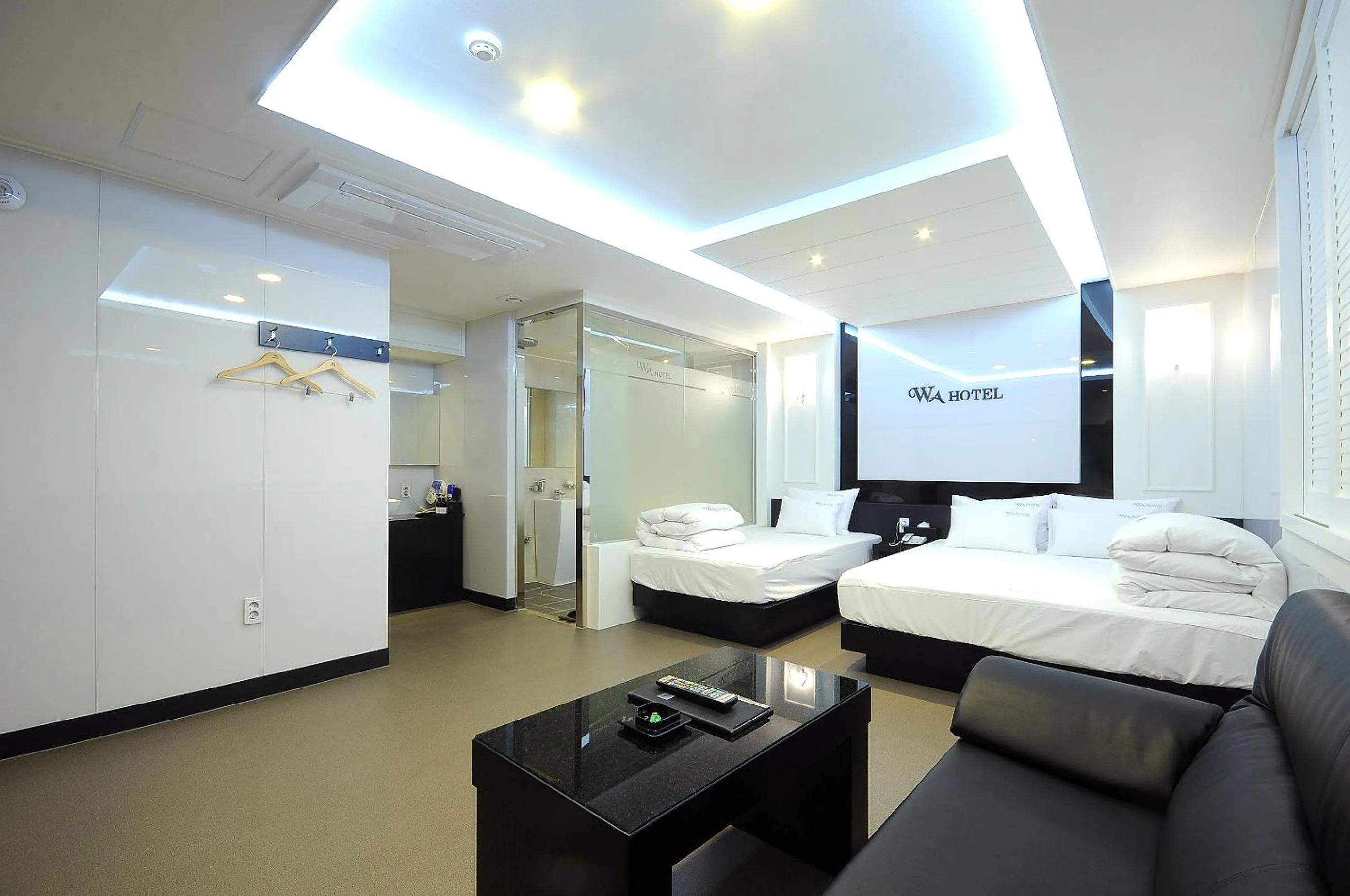 Photo of the whole room, Bed in WA Hotel