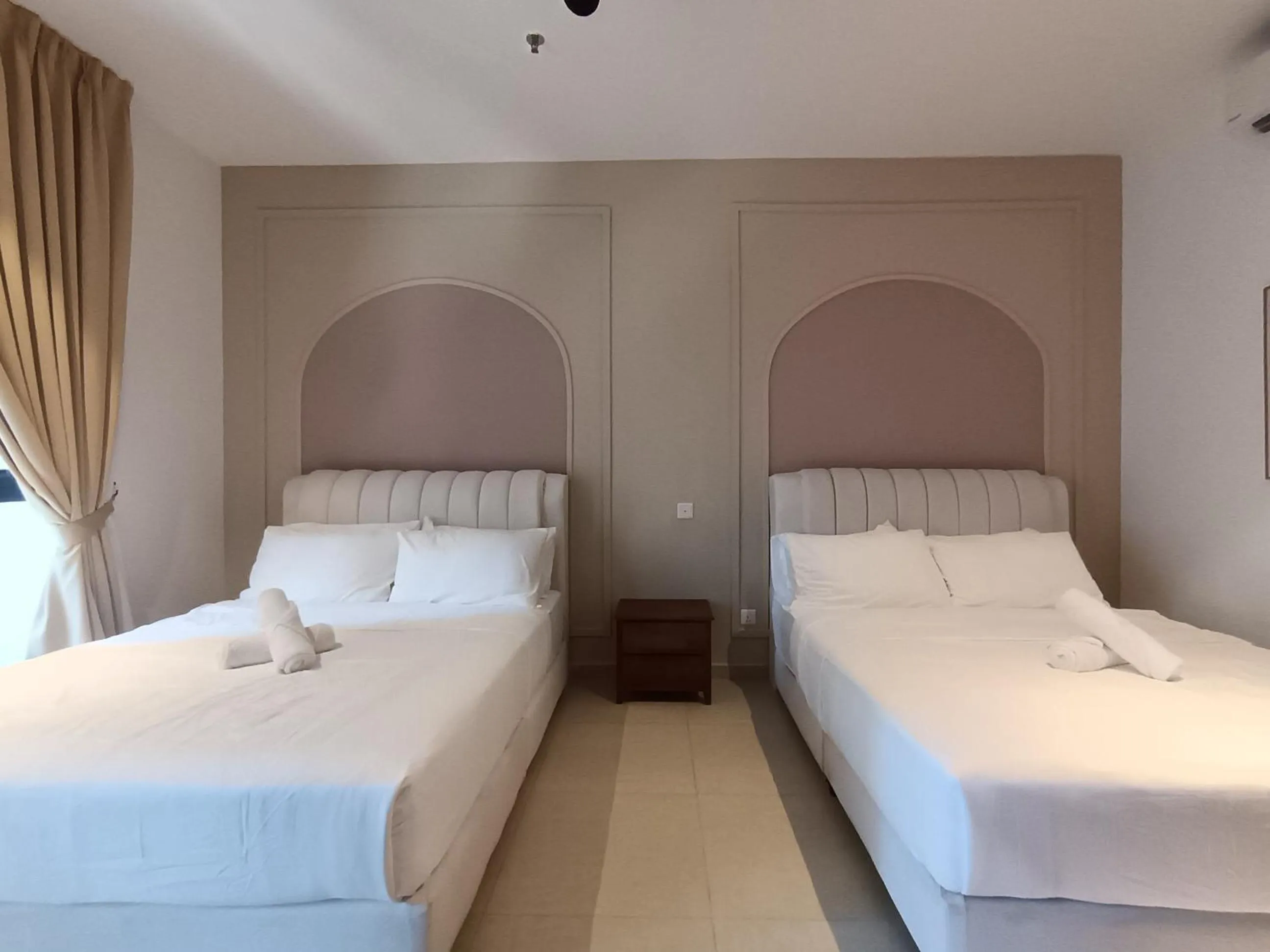 Bed in The Paxtonz by Manhattan Group