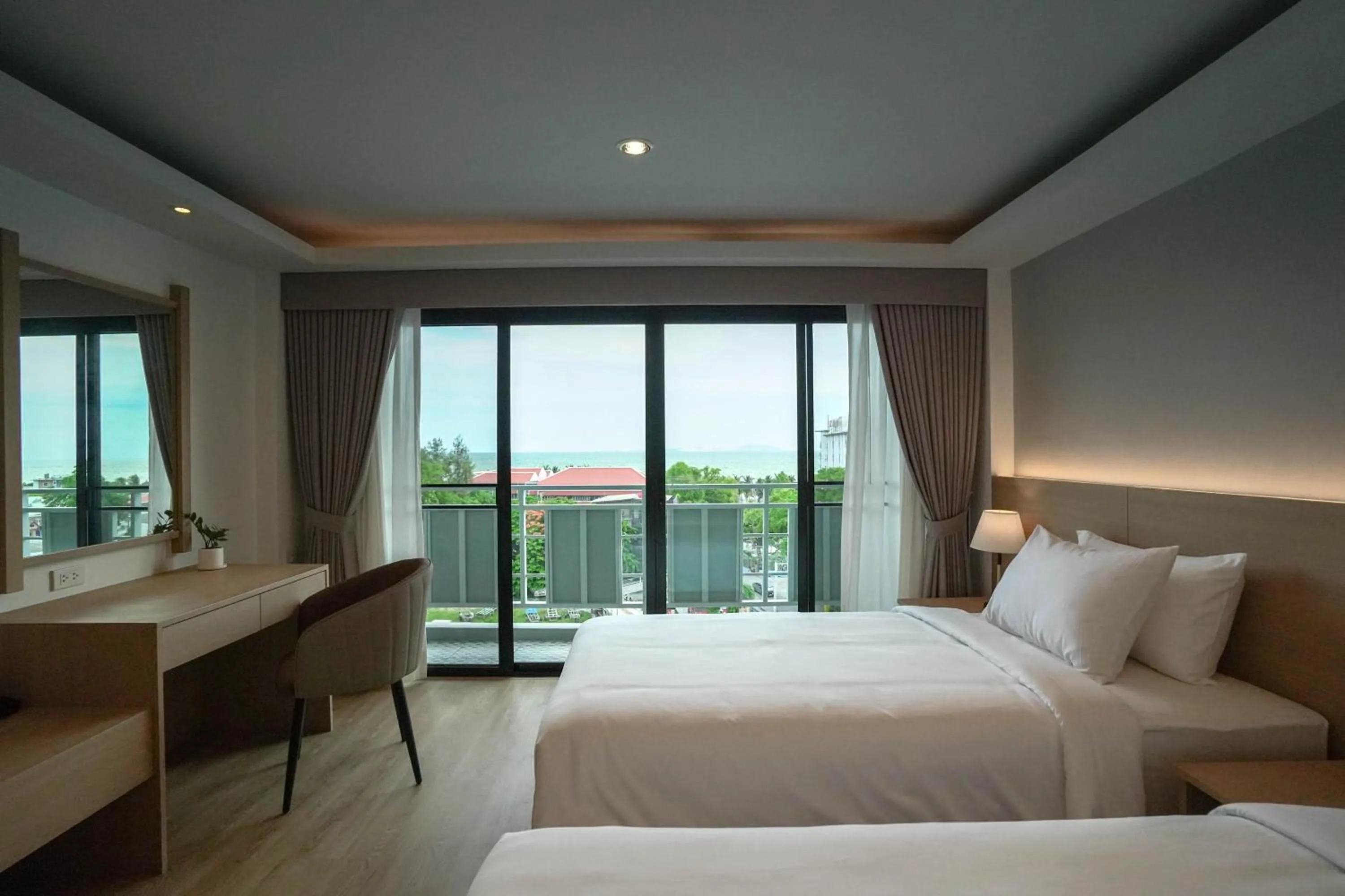 Bed in The Kite Hotel Bangsaen by Koko