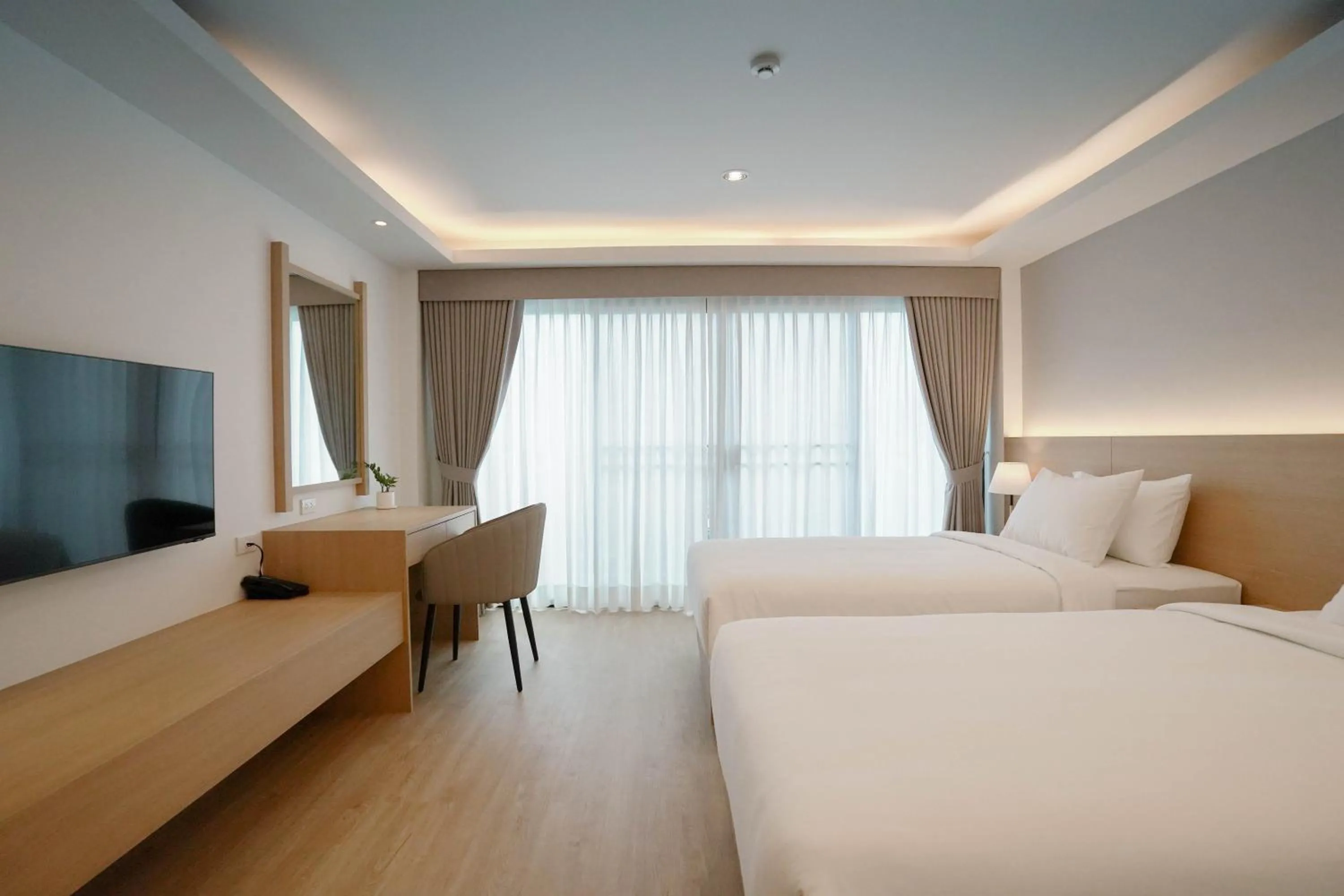 Bed in The Kite Hotel Bangsaen by Koko